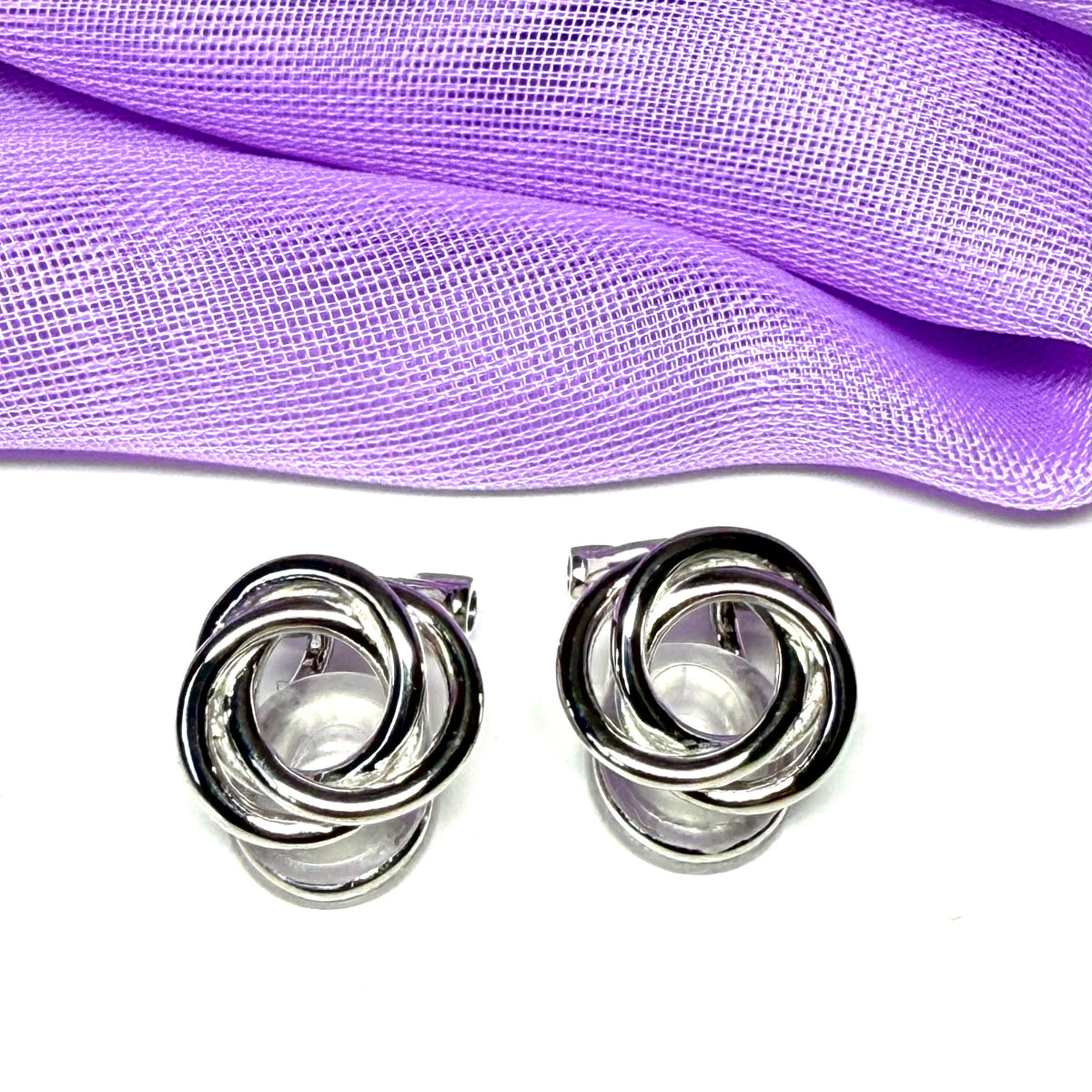 Clip on earrings sterling silver open knot design