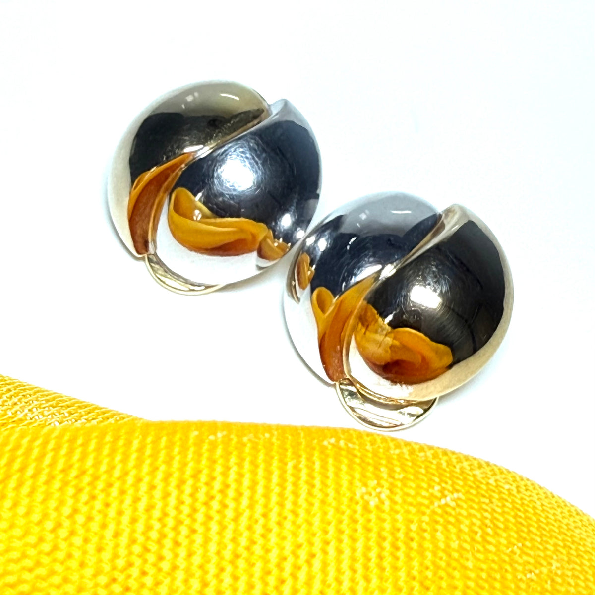 Clip on earrings with two tone yellow and white gold