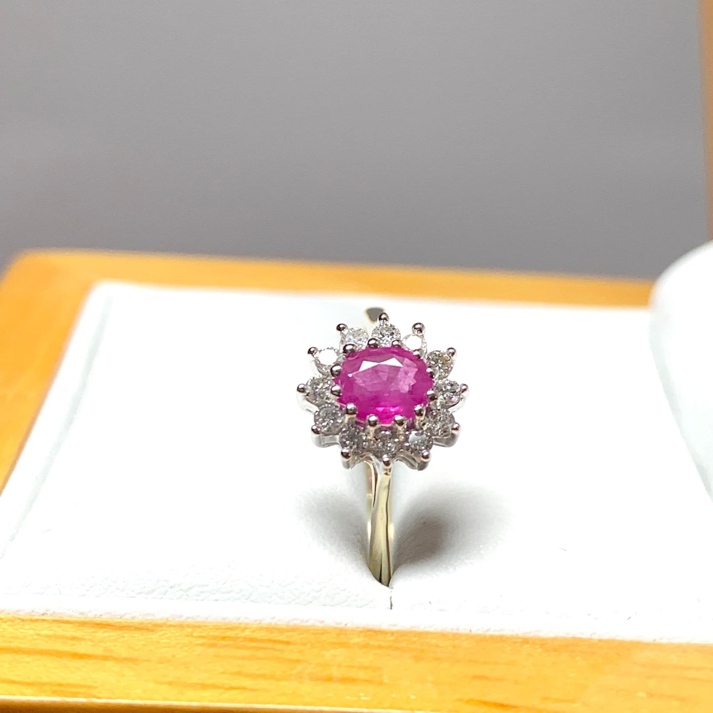 Oval Ruby And Diamond Cluster Ring in Yellow Gold