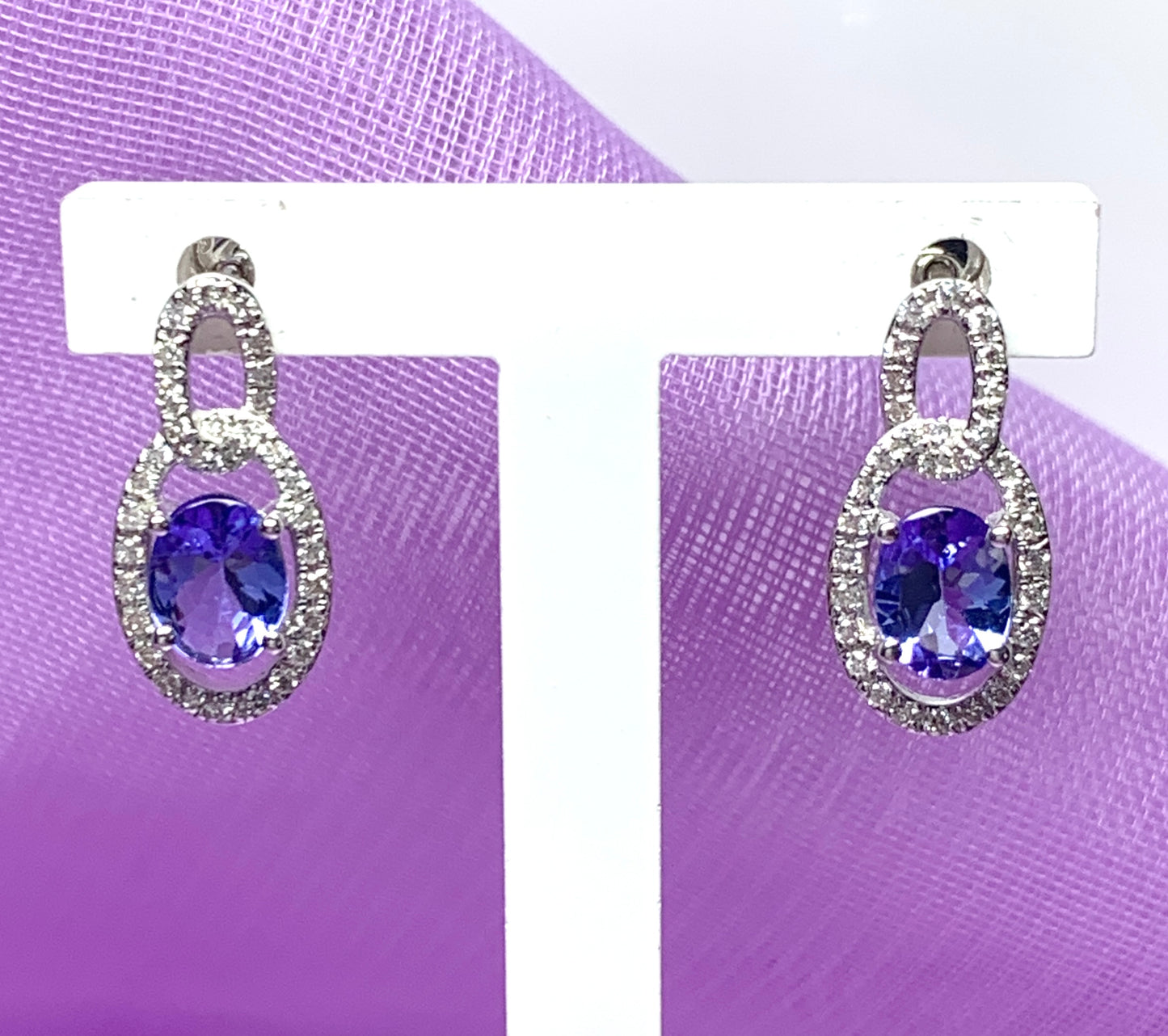 Oval cluster tanzanite and diamond earrings