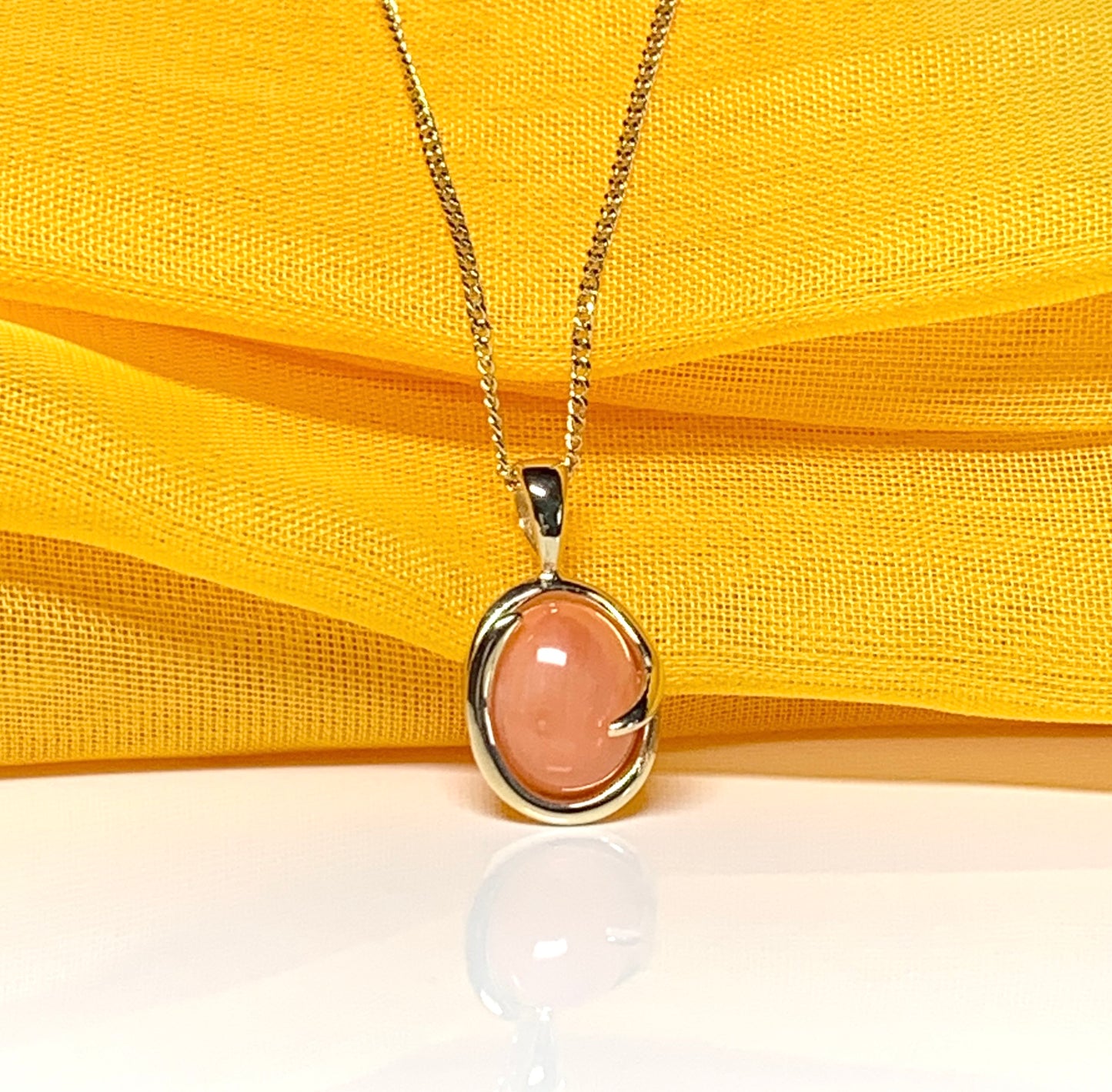 Coral yellow gold fancy oval necklace