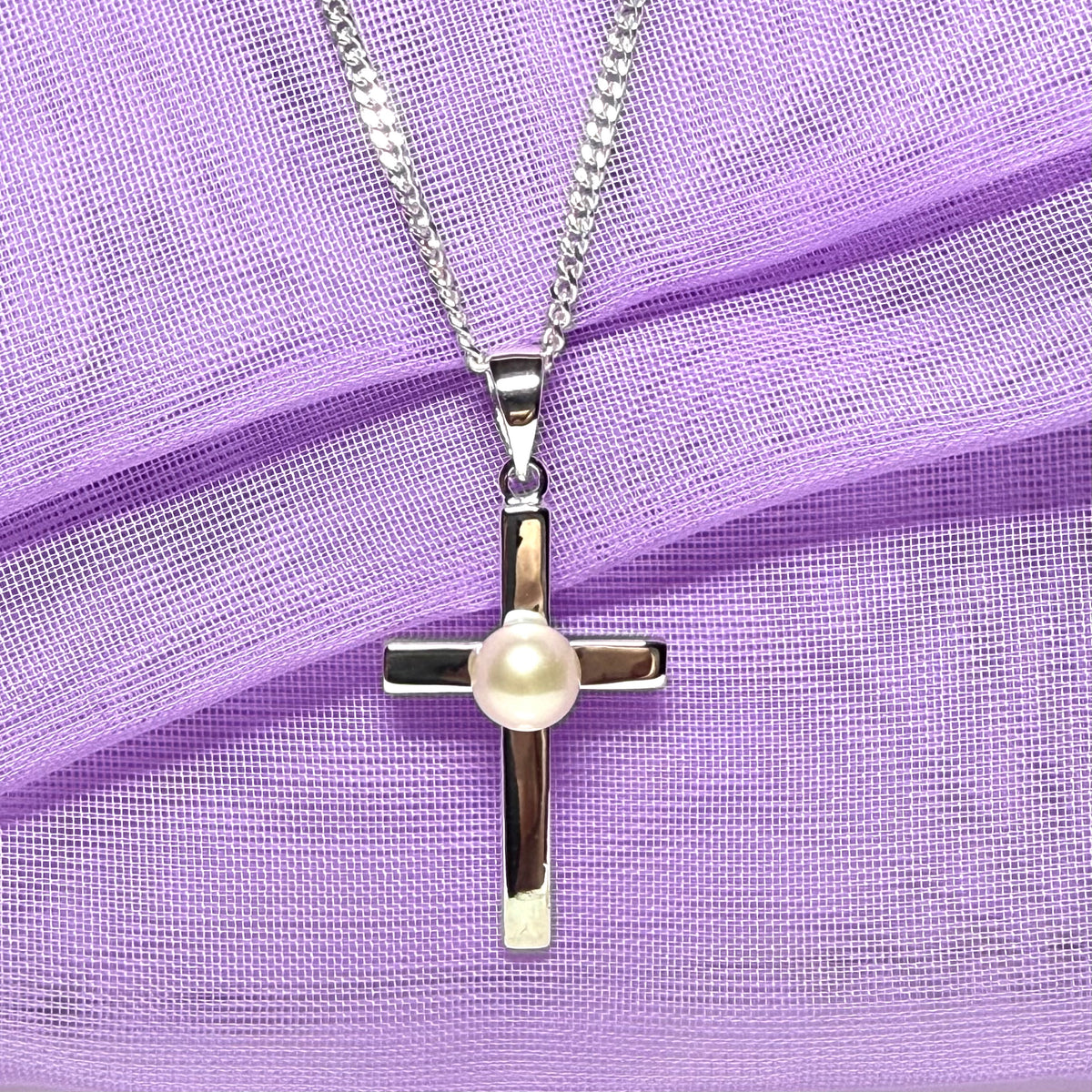Cross necklace with a real freshwater pearl in the middle sterling silver including a chain