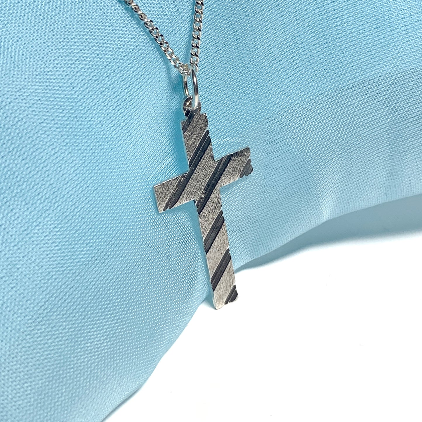 Cross patterned solid sterling silver diamond cut including chain