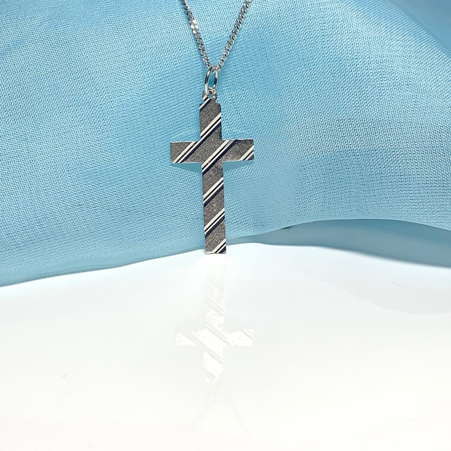 Cross patterned solid sterling silver diamond cut including chain