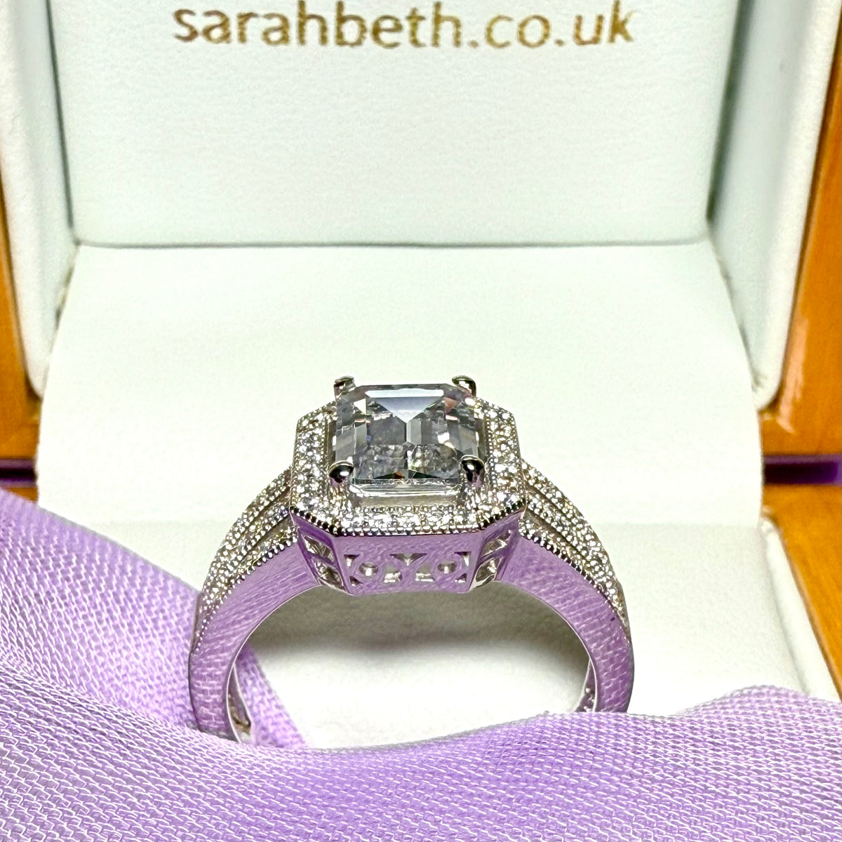 Cubic zirconia sterling silver emerald cut fancy dress ring