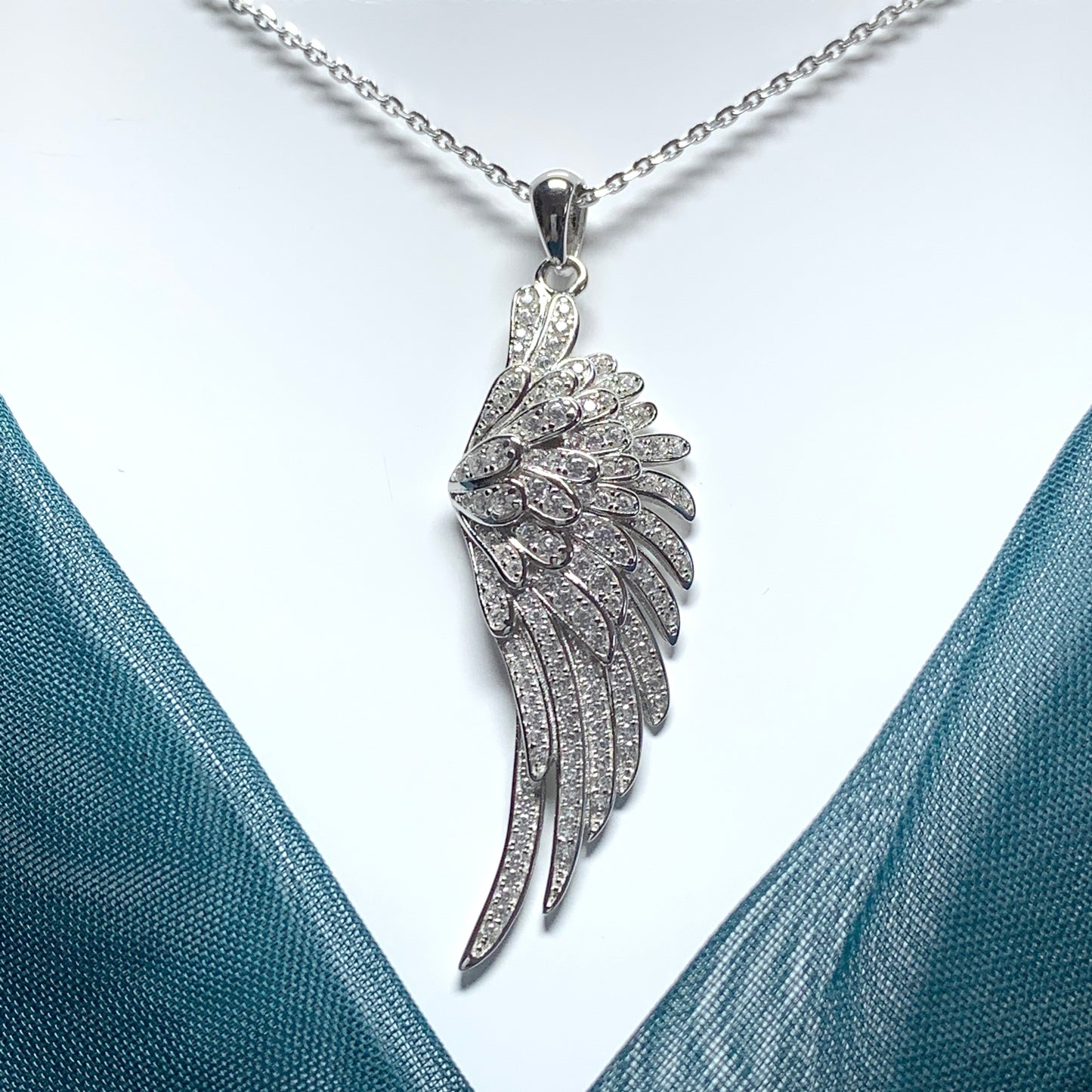 Cubic zirconia angle wing necklace pendent