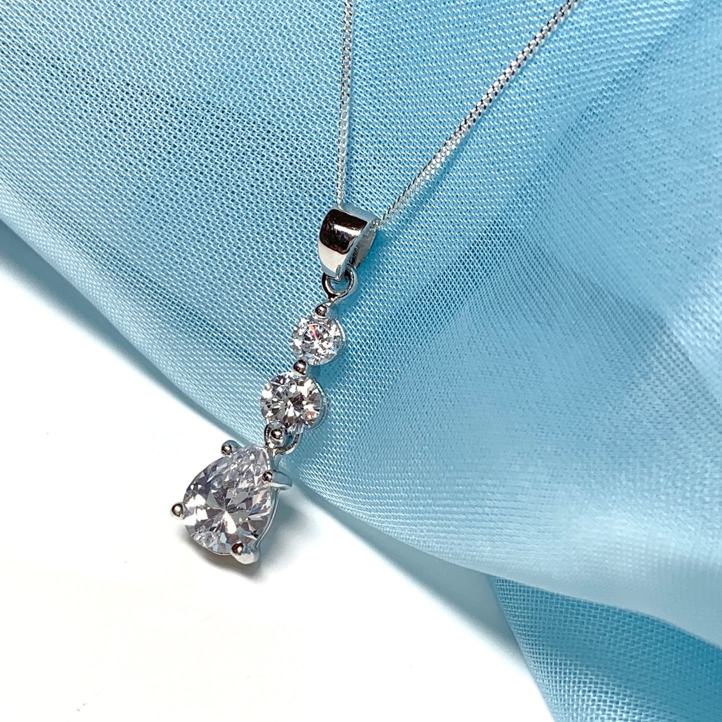 Cubic zirconia trilogy sterling silver necklace