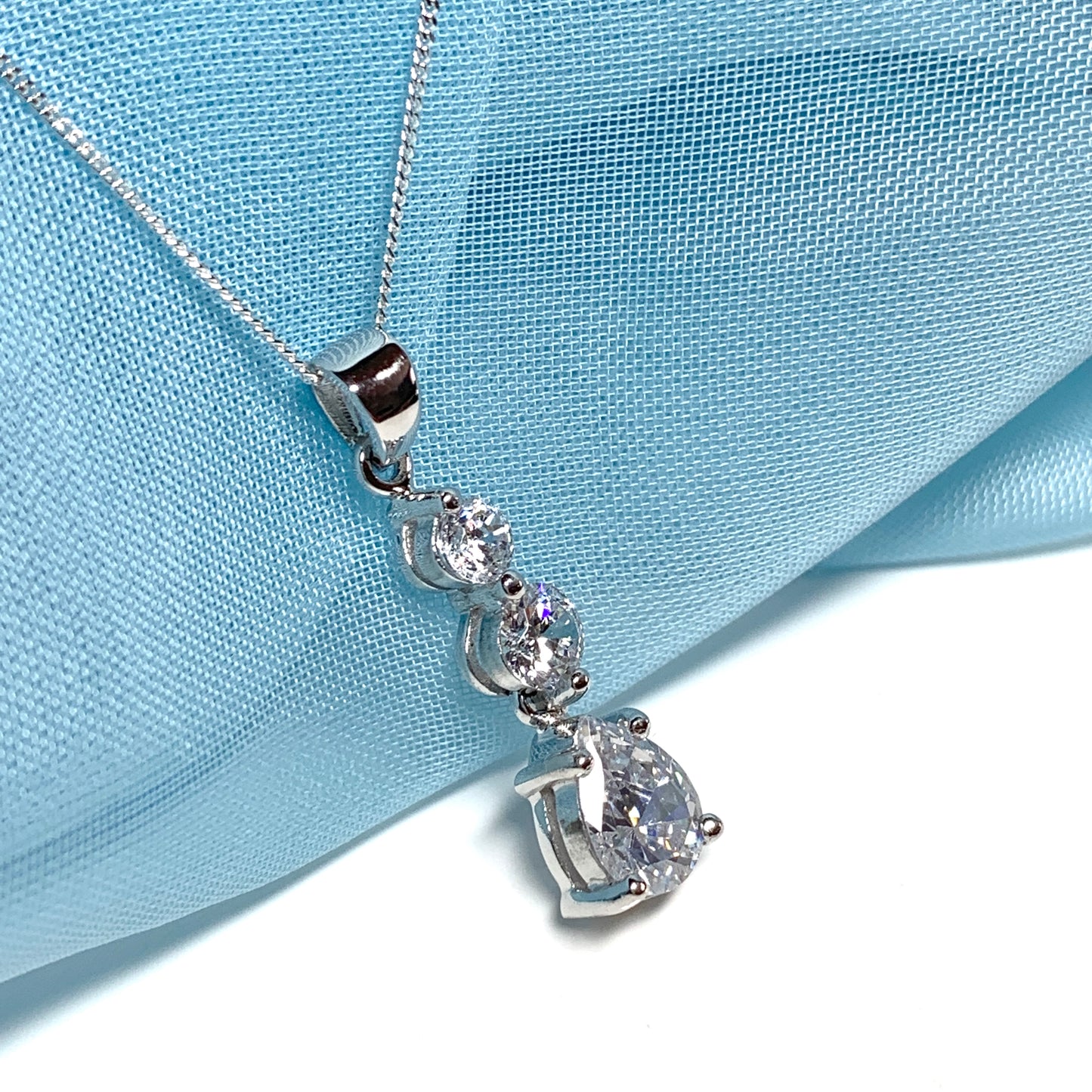 Cubic zirconia trilogy sterling silver necklace