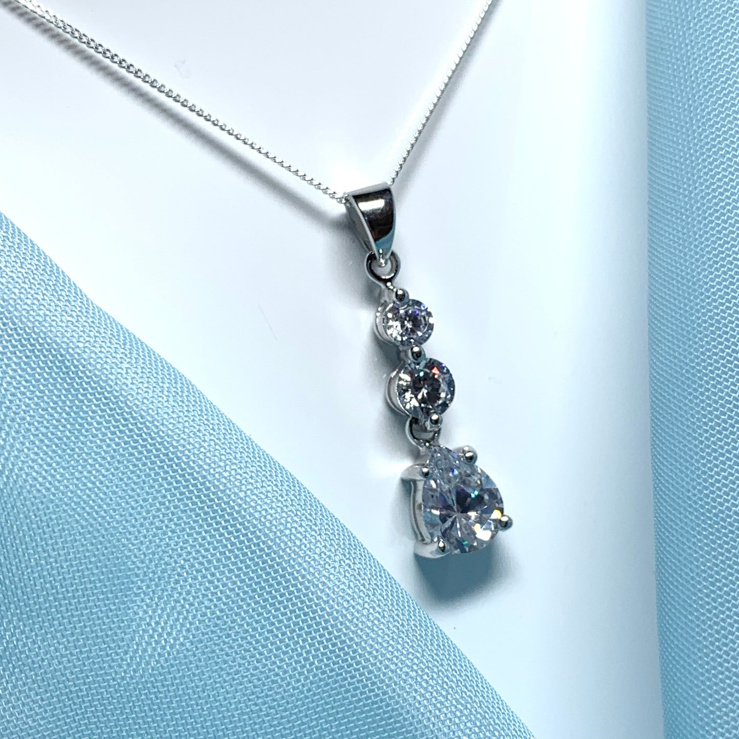 Cubic zirconia trilogy sterling silver necklace