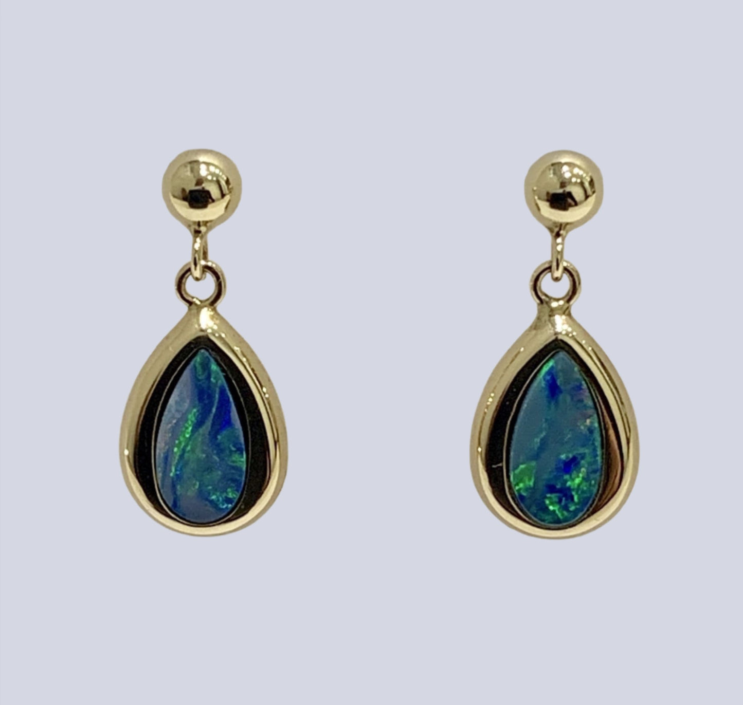 Dark blue real opal pear teardrop shaped yellow gold drop earrings