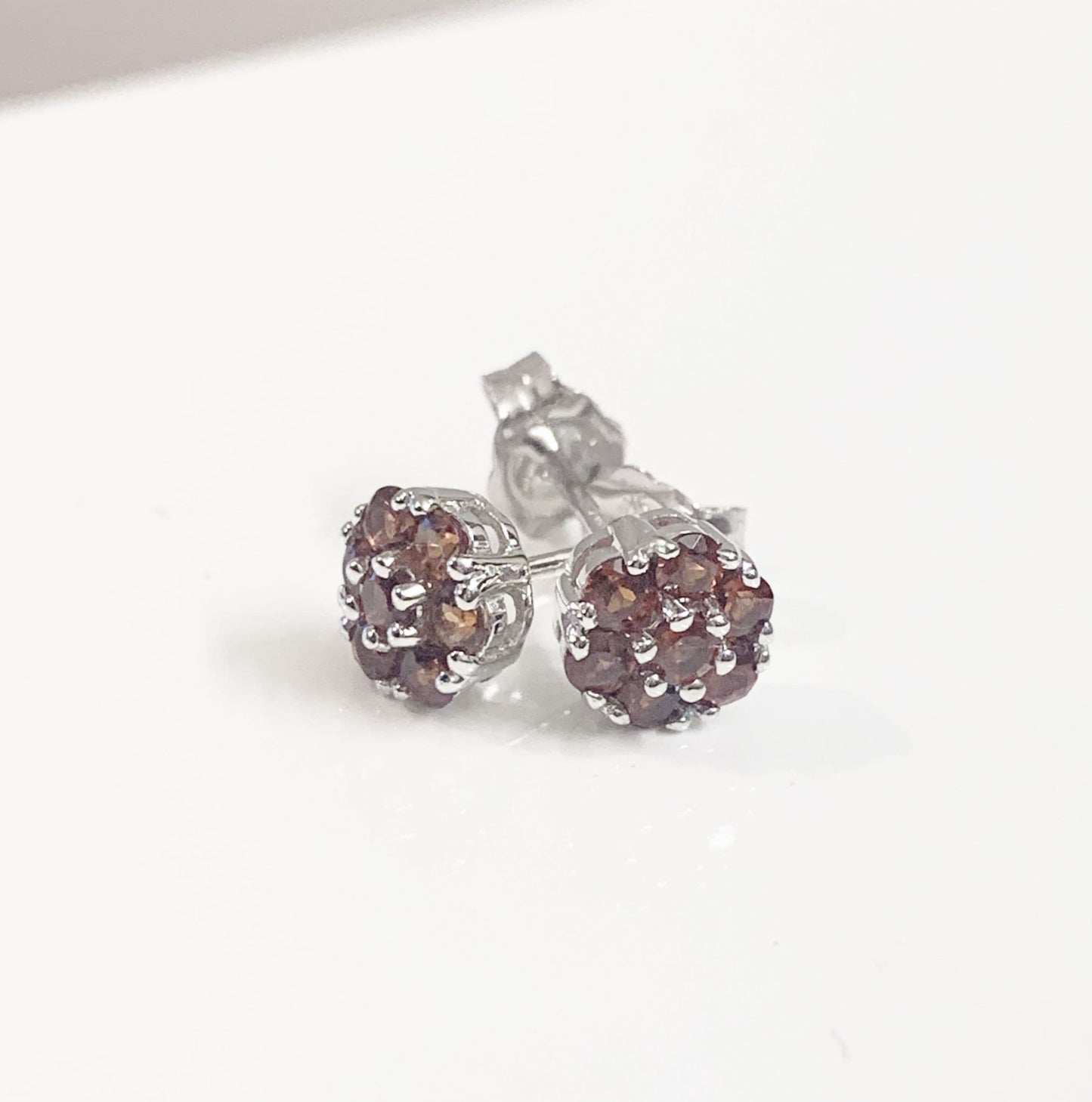 Deep red garnet white gold daisy cluster stud earrings