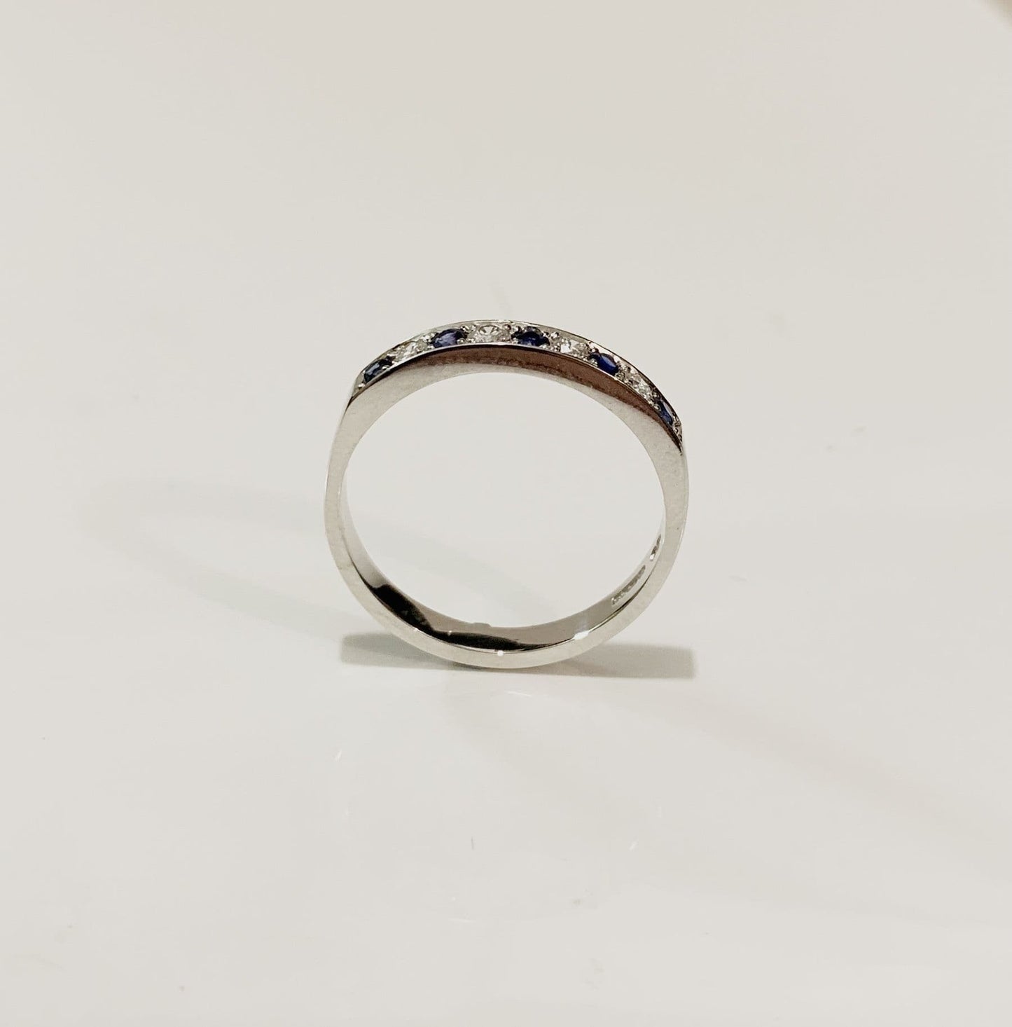 Blue Sapphire And Diamond White Gold Eternity Ring