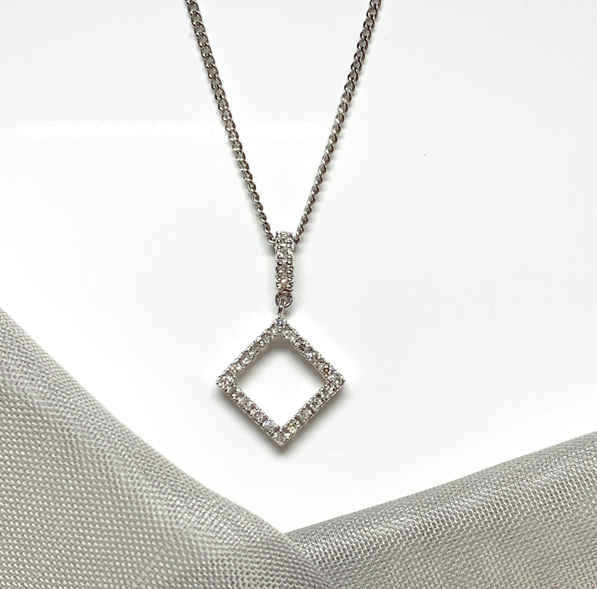 Diamond necklace white gold square shaped open fancy pendant
