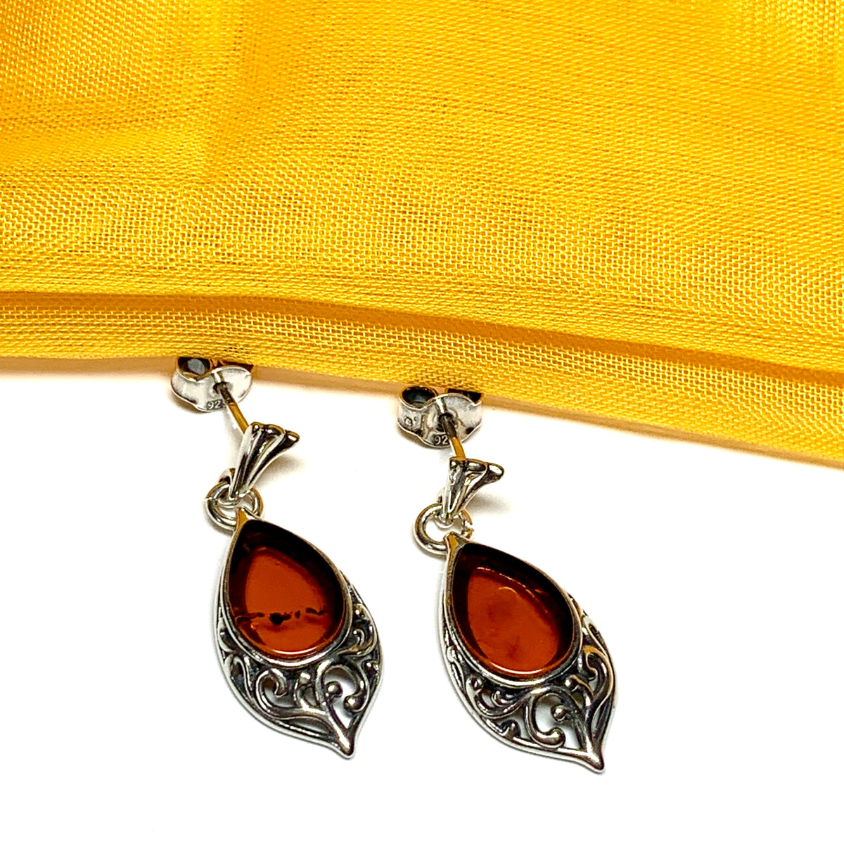 Earrings real amber drop earrings with a scrolled pattern sterling silver