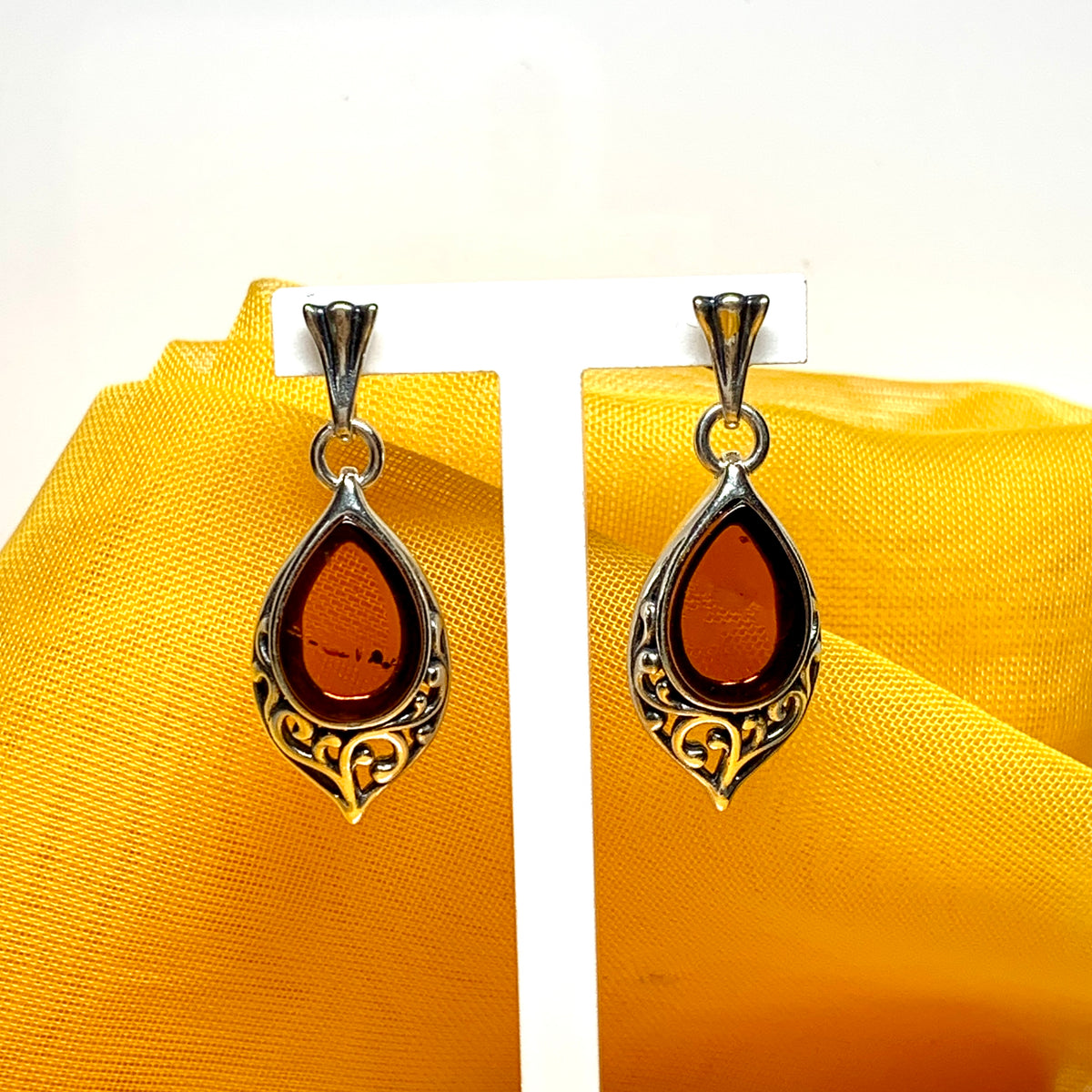 Earrings real amber drop earrings with a scrolled pattern sterling silver