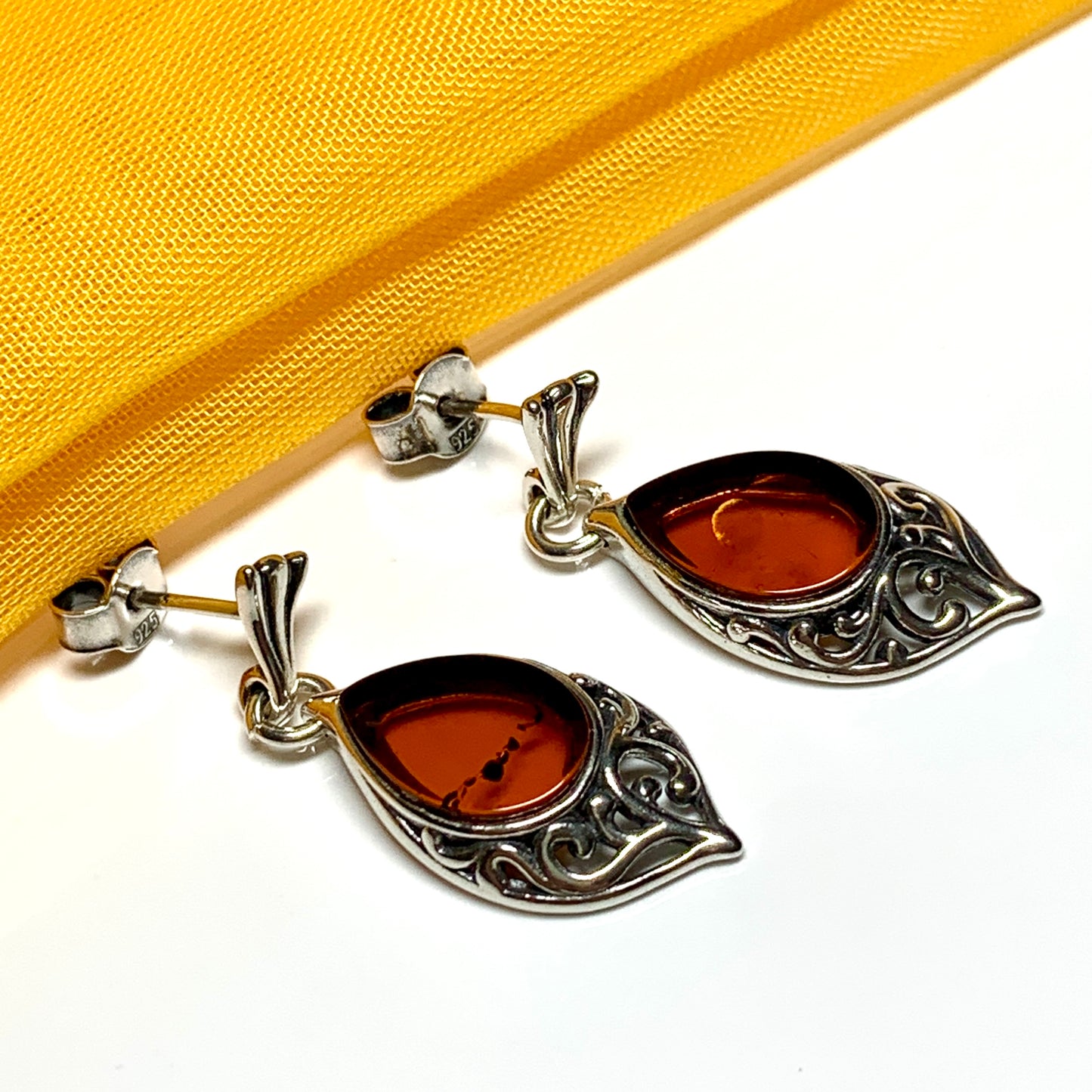 Earrings real amber drop earrings with a scrolled pattern sterling silver