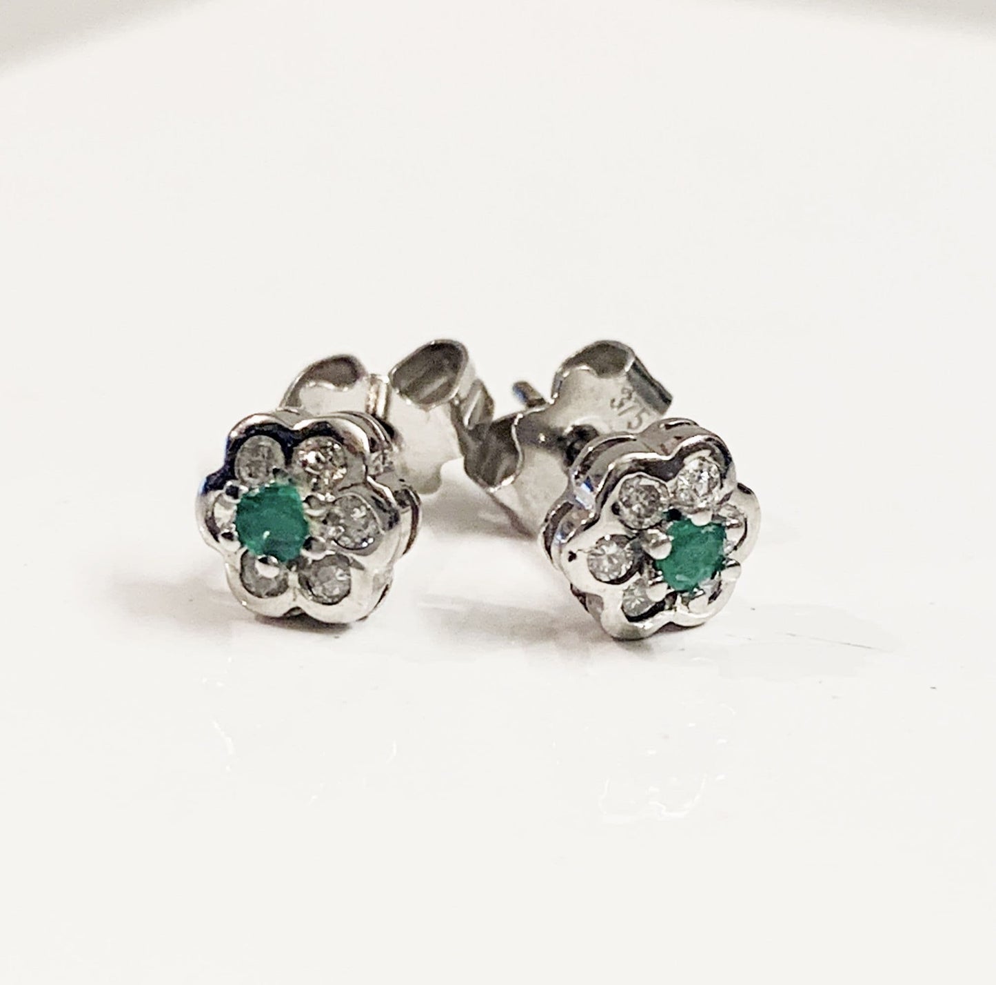 Real emerald and diamond stud earrings white gold round daisy cluster