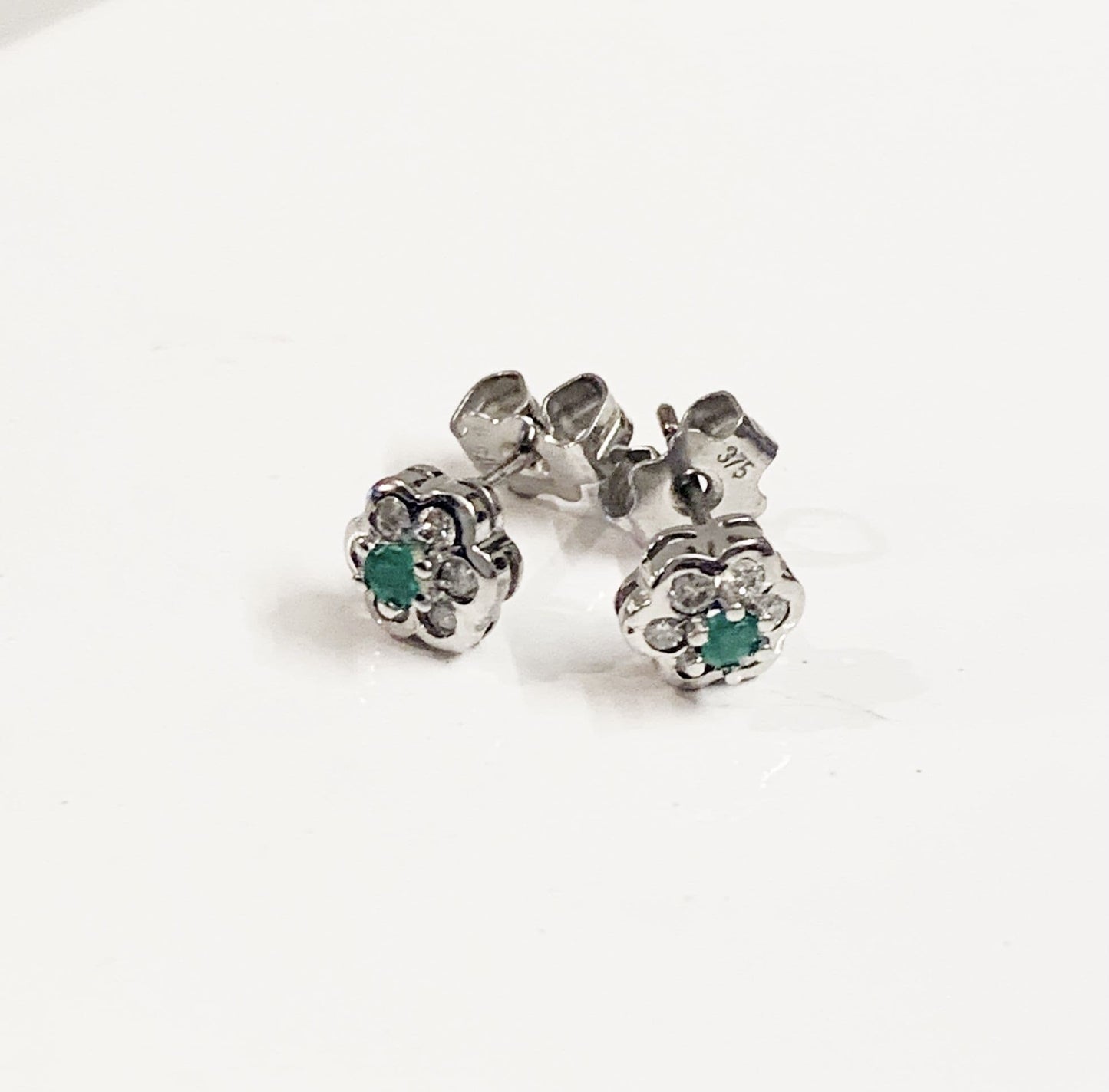 Real emerald and diamond stud earrings white gold round daisy cluster