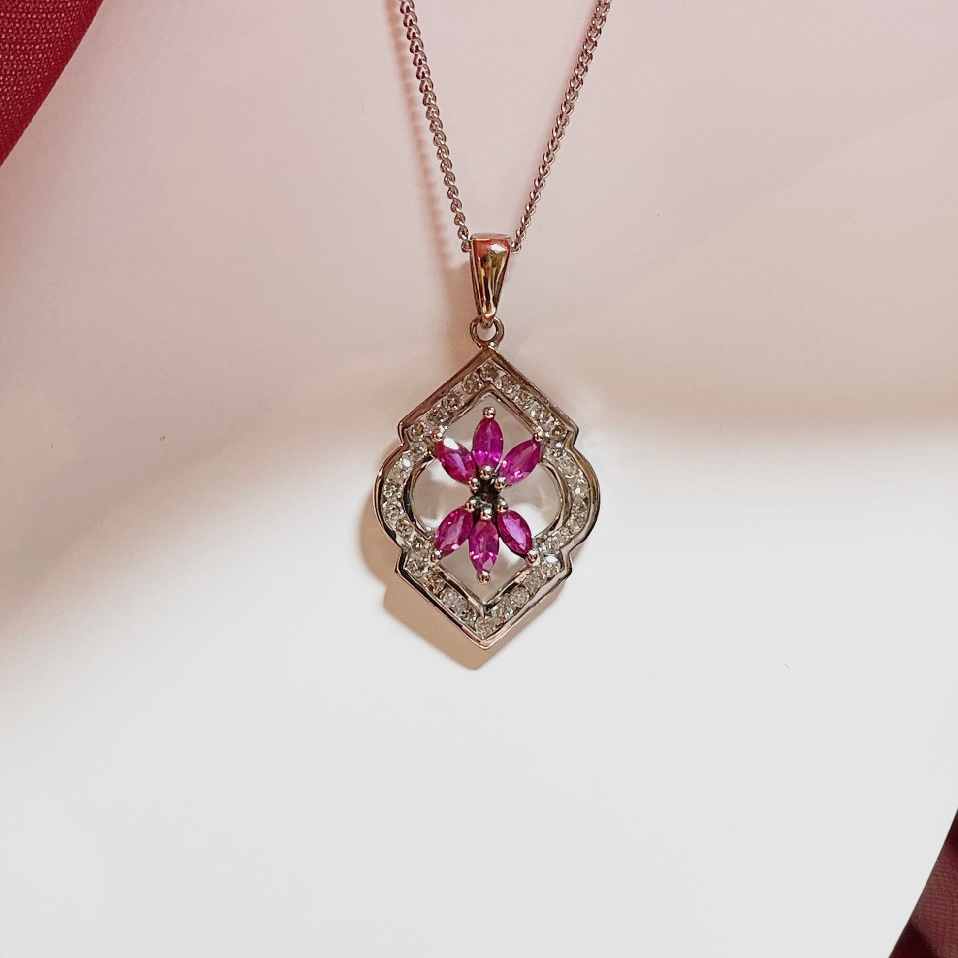 Fancy ruby and diamond white gold pendant necklace