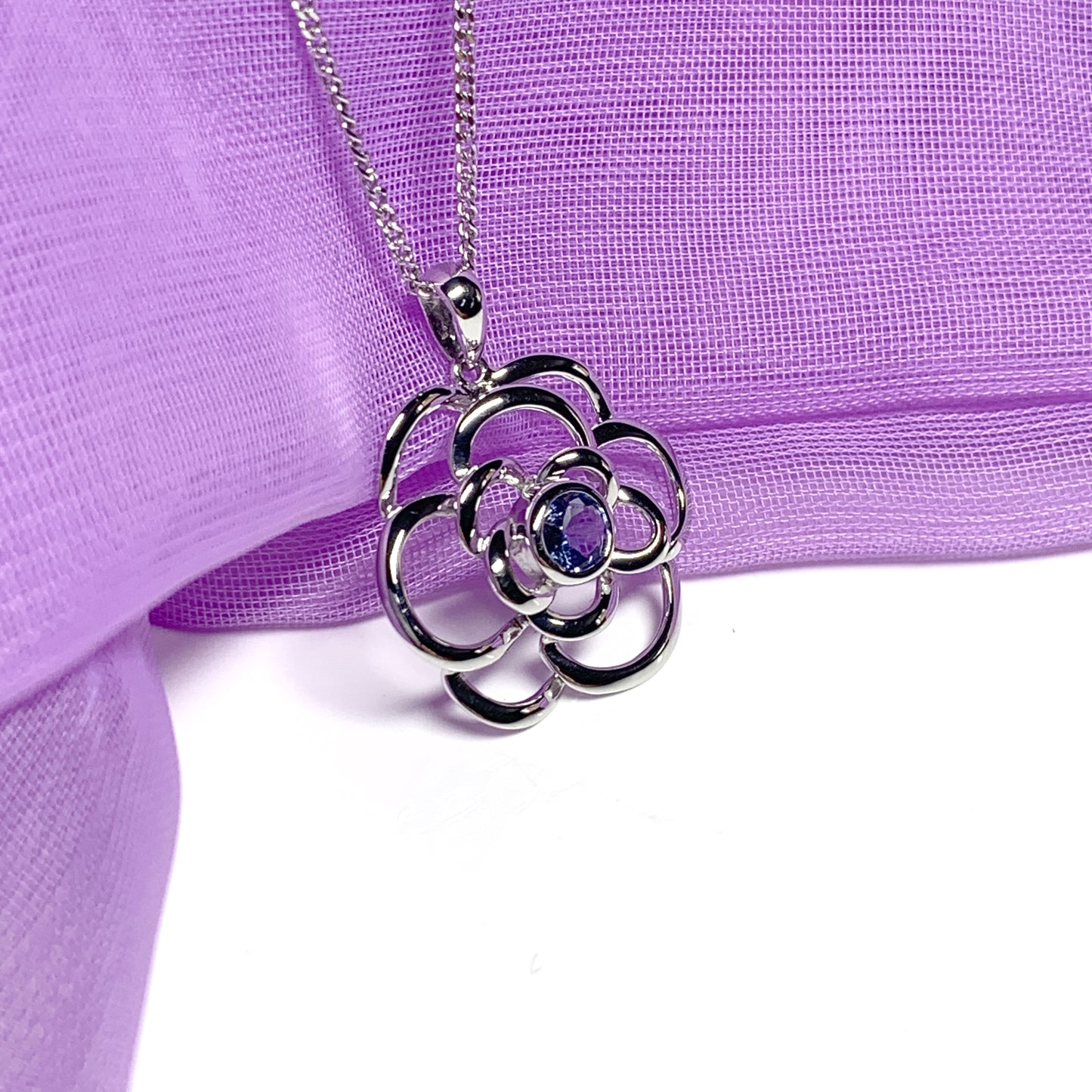 Real tanzanite round swirl necklace made in white gold