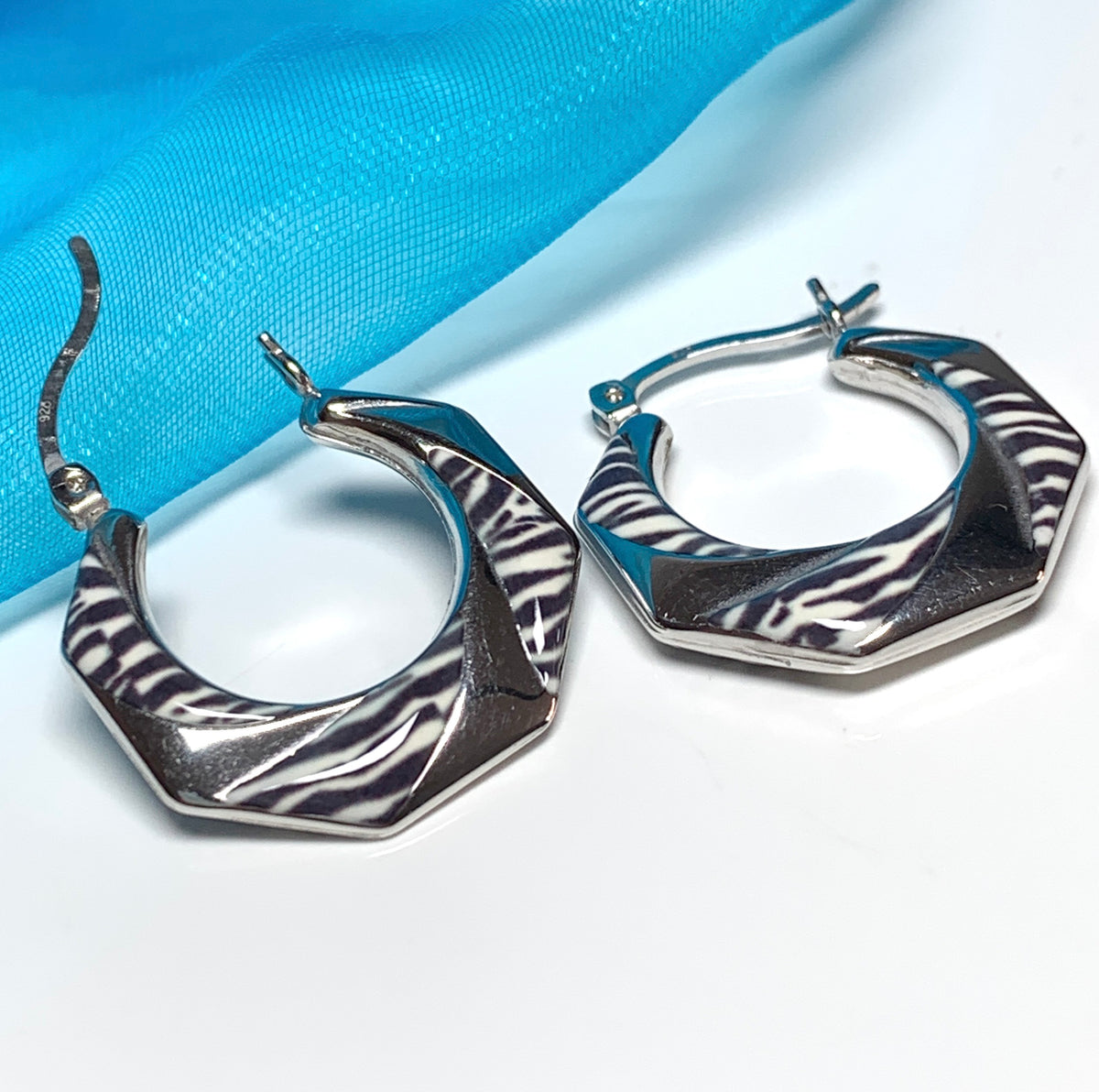 Fancy zebra patterned enamelled sterling silver octagonal hoop earrings