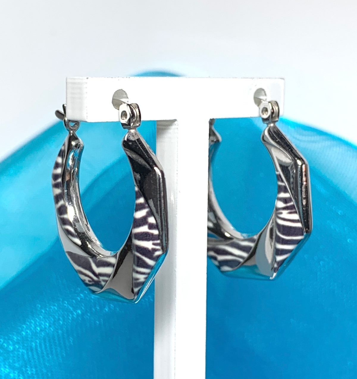 Fancy zebra patterned enamelled sterling silver octagonal hoop earrings