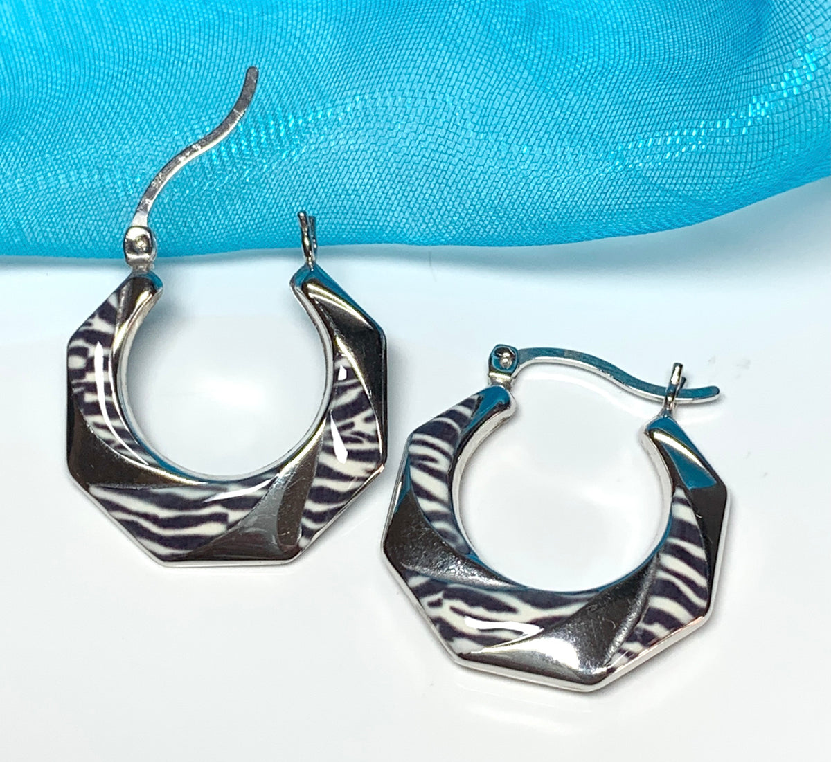 Fancy zebra patterned enamelled sterling silver octagonal hoop earrings