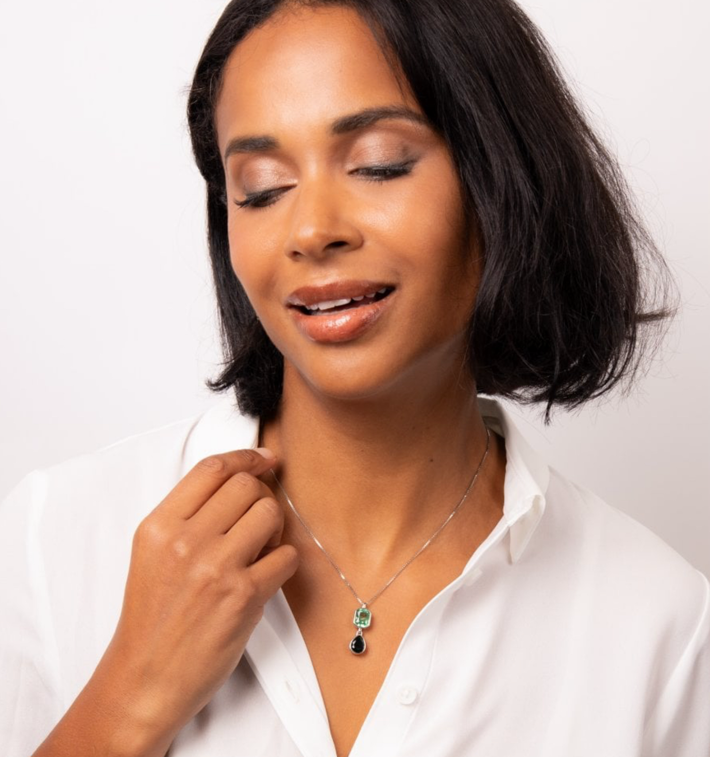 Fiorelli green and black coloured octagonal and teardrop shaped double crystal necklace