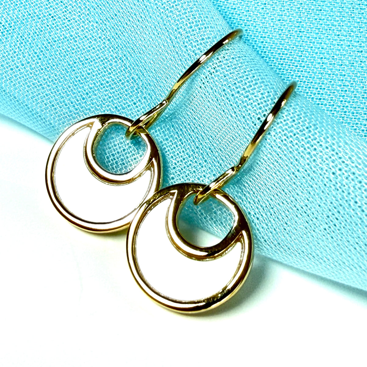 Fiorelli drop earrings round Mother Of Pearl gold plated sterling silver