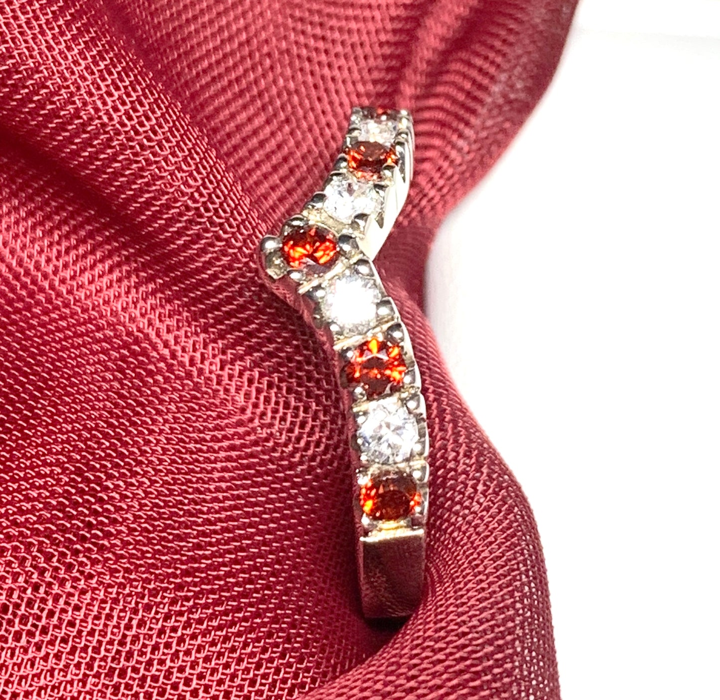Garnet coloured wishbone ring sterling silver with cubic zirconia stones