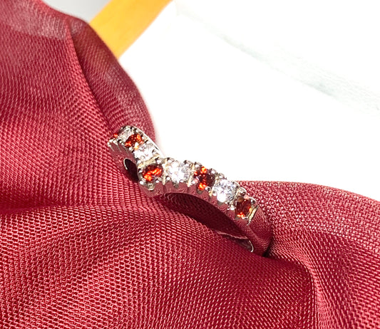 Garnet coloured wishbone ring sterling silver with cubic zirconia stones