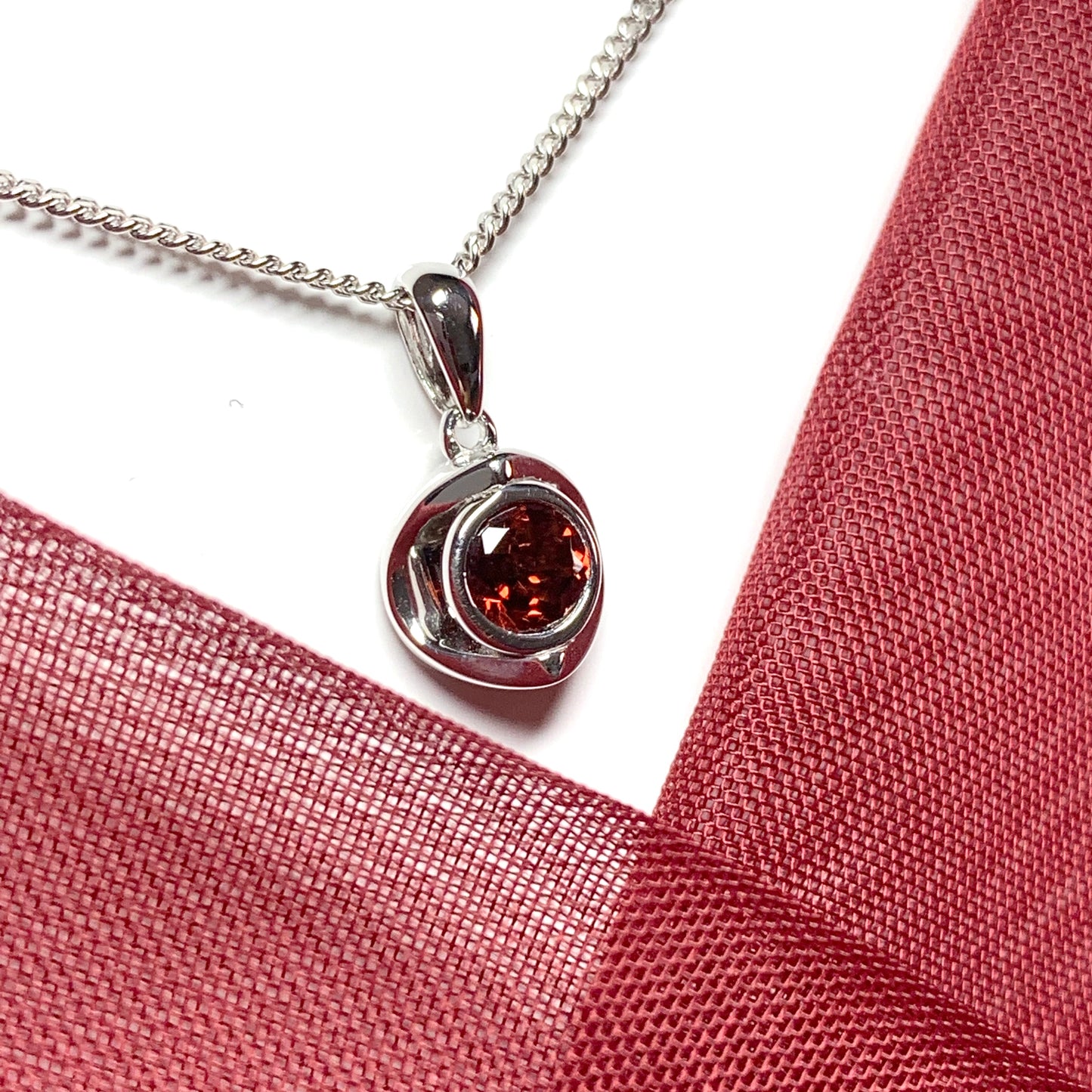 Round garnet sterling silver necklace