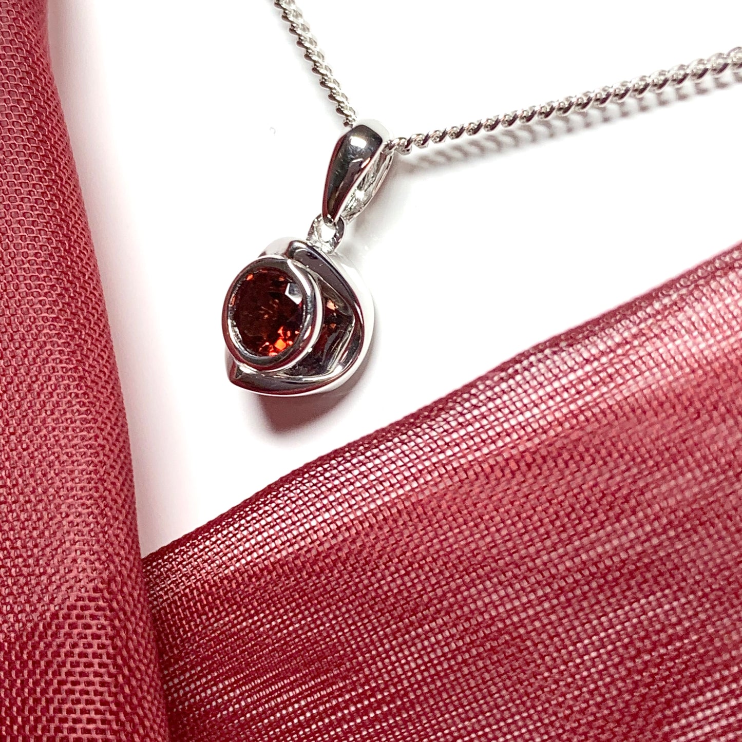 Round garnet sterling silver necklace