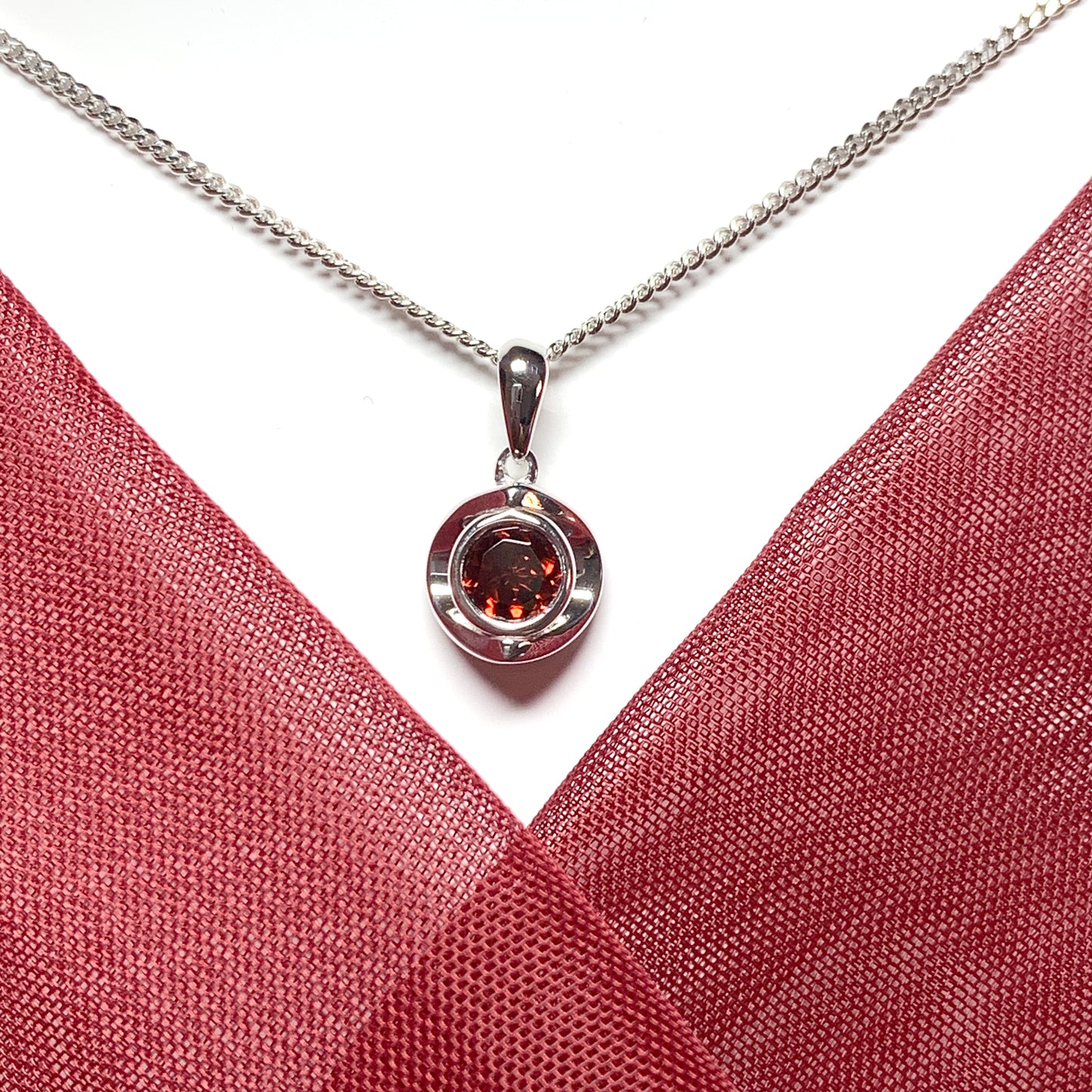 Round garnet sterling silver necklace