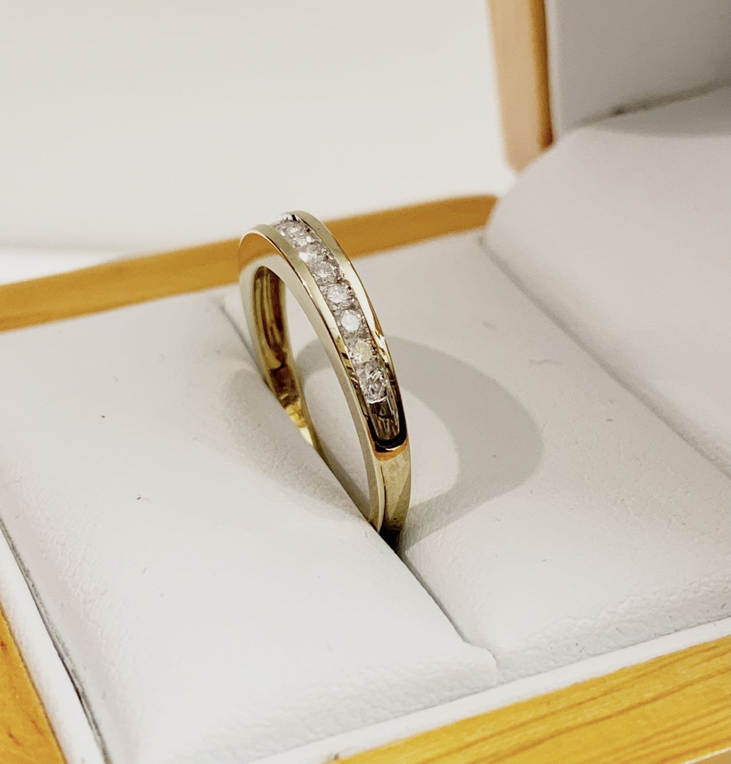 Yellow gold diamond eternity ring channel setting 25 points
