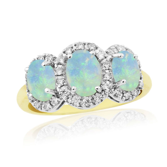 Gold oval cut three real opal and diamond trilogy cluster ring