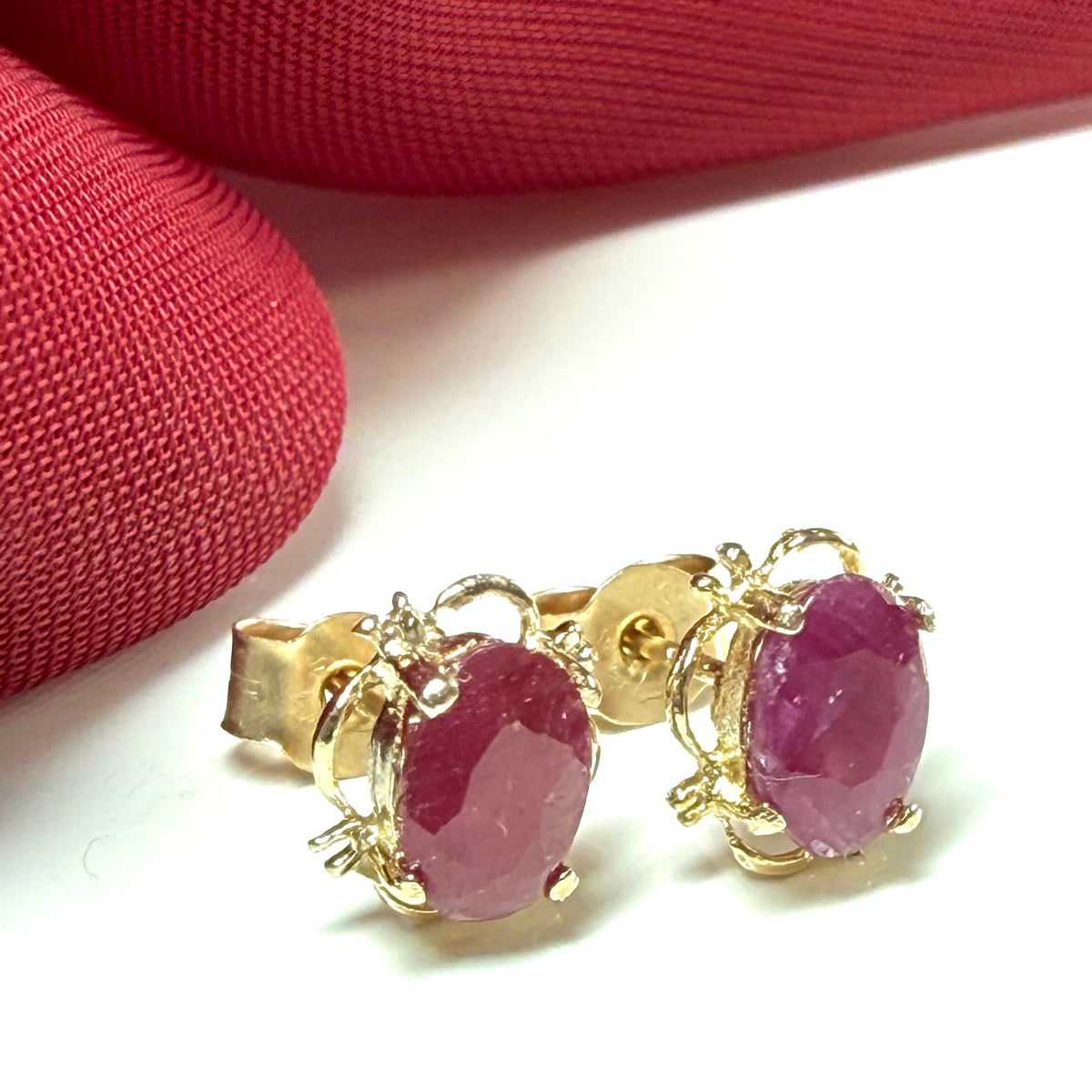 Yellow Gold Pierced Oval Ruby Stud Earrings