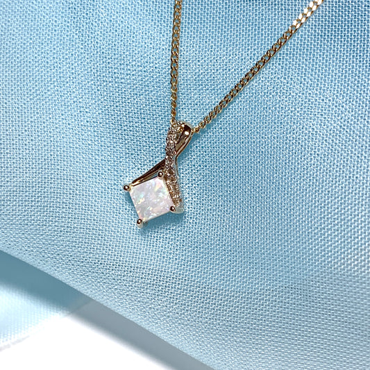 Gold opal and diamond necklace pendent