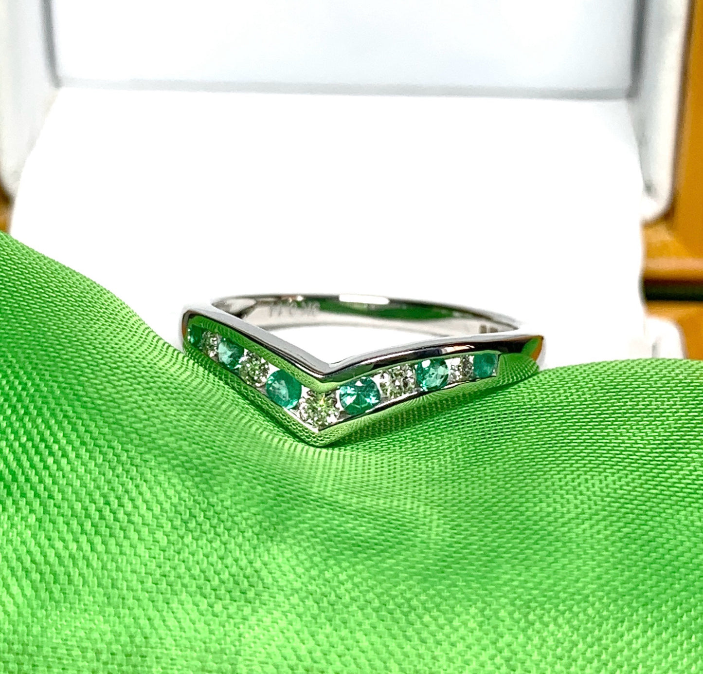 Green Emerald And Diamond White Gold Wishbone Ring Rubbed Smooth Over Setting