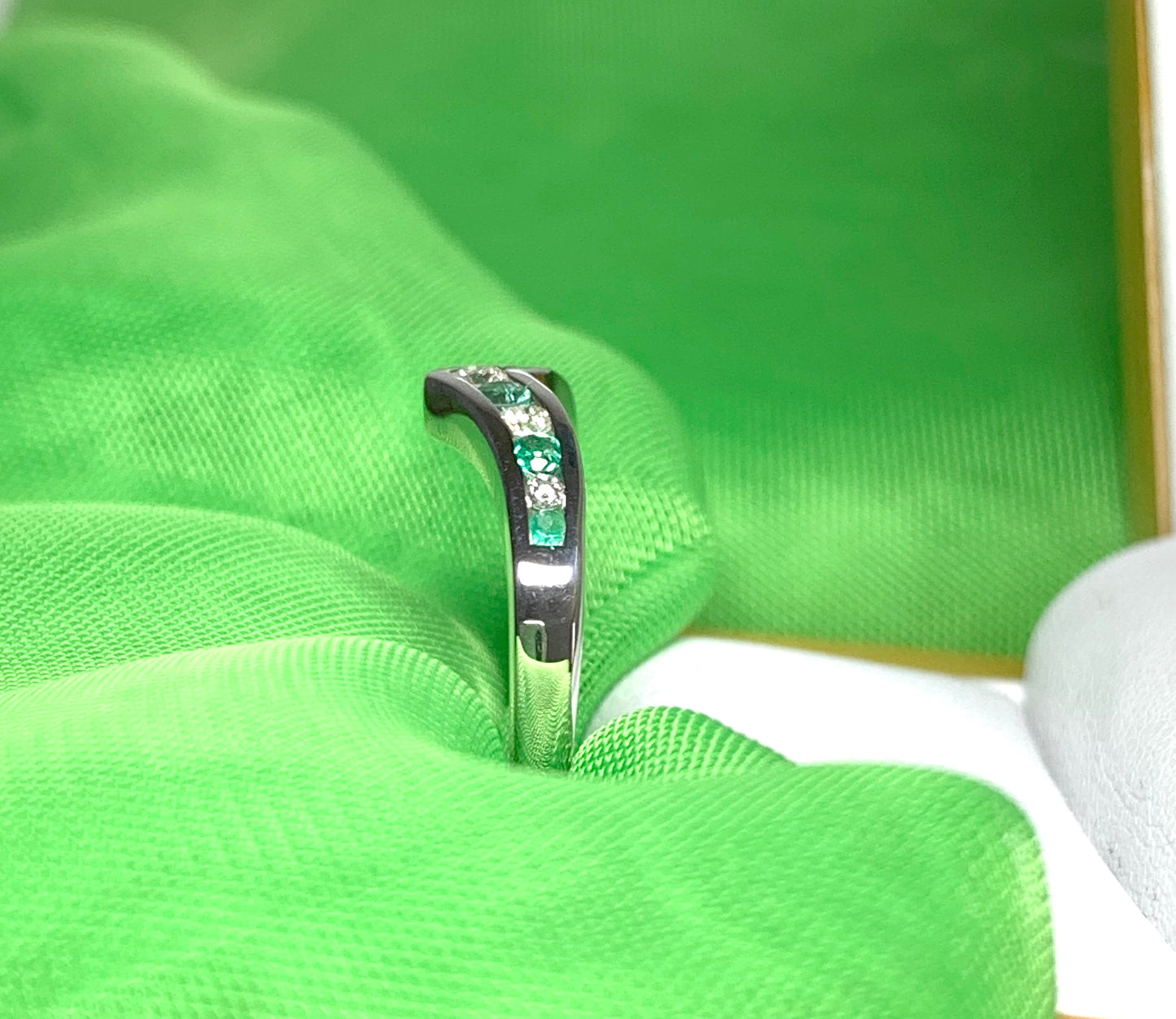 Green Emerald And Diamond White Gold Wishbone Ring Rubbed Smooth Over Setting