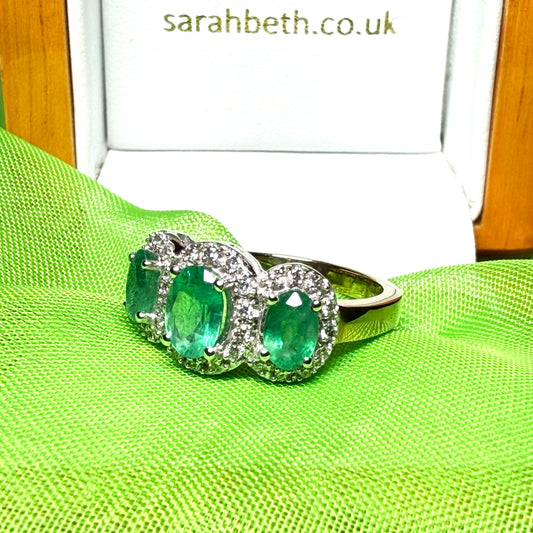 Green Oval Emerald And Diamond Trilogy Cluster Ring