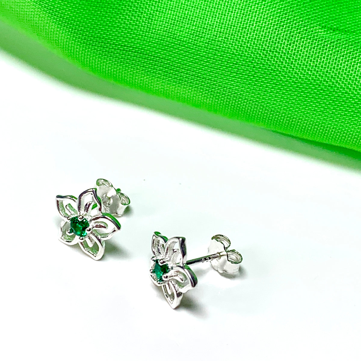 Green cubic zirconia flower shaped dress stud earrings