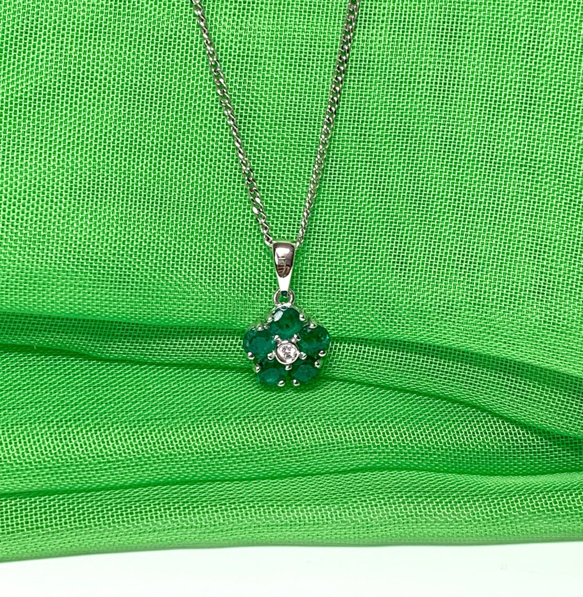 Green emerald and diamond white gold daisy cluster necklace