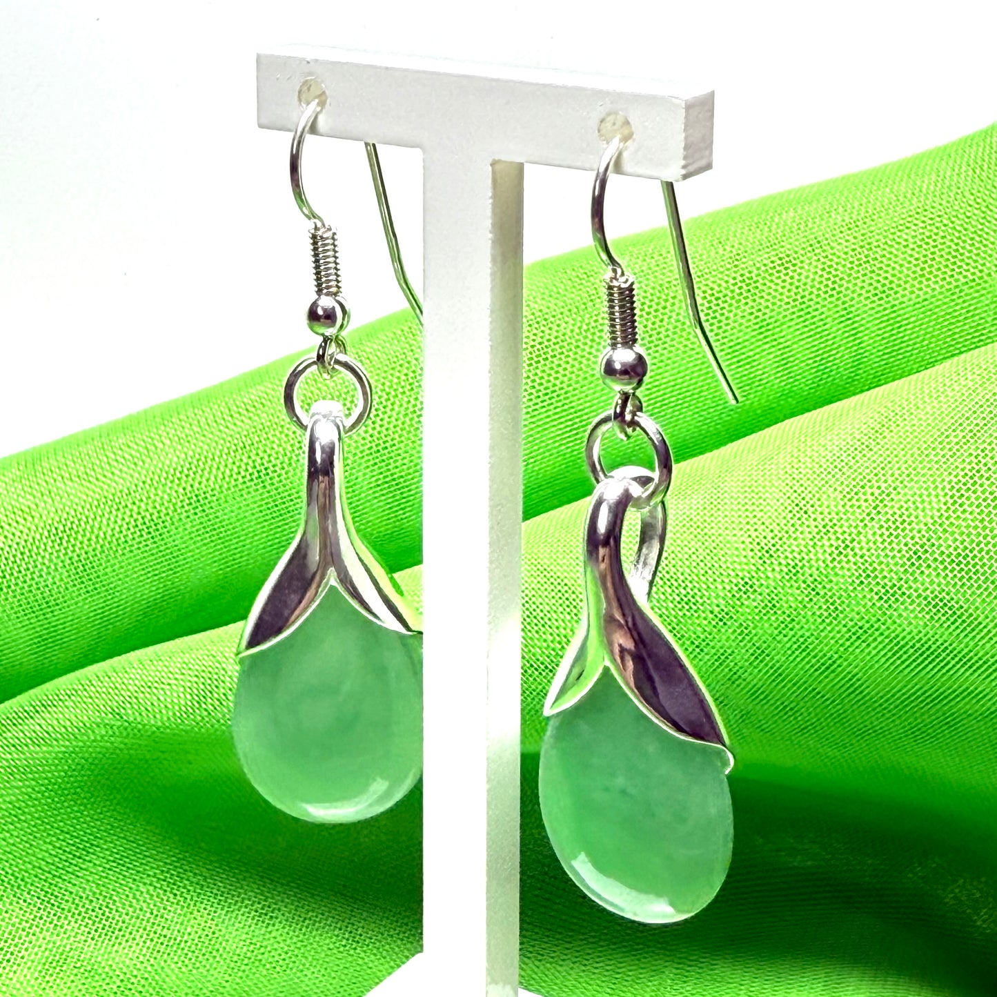 Green real jade teardrop pear shaped drop earrings within sterling silver setting