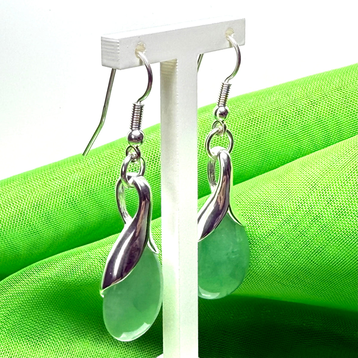 Green real jade teardrop pear shaped drop earrings within sterling silver setting