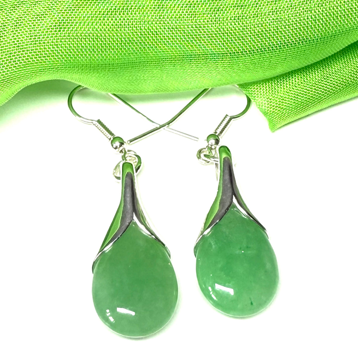 Green real jade teardrop pear shaped drop earrings within sterling silver setting