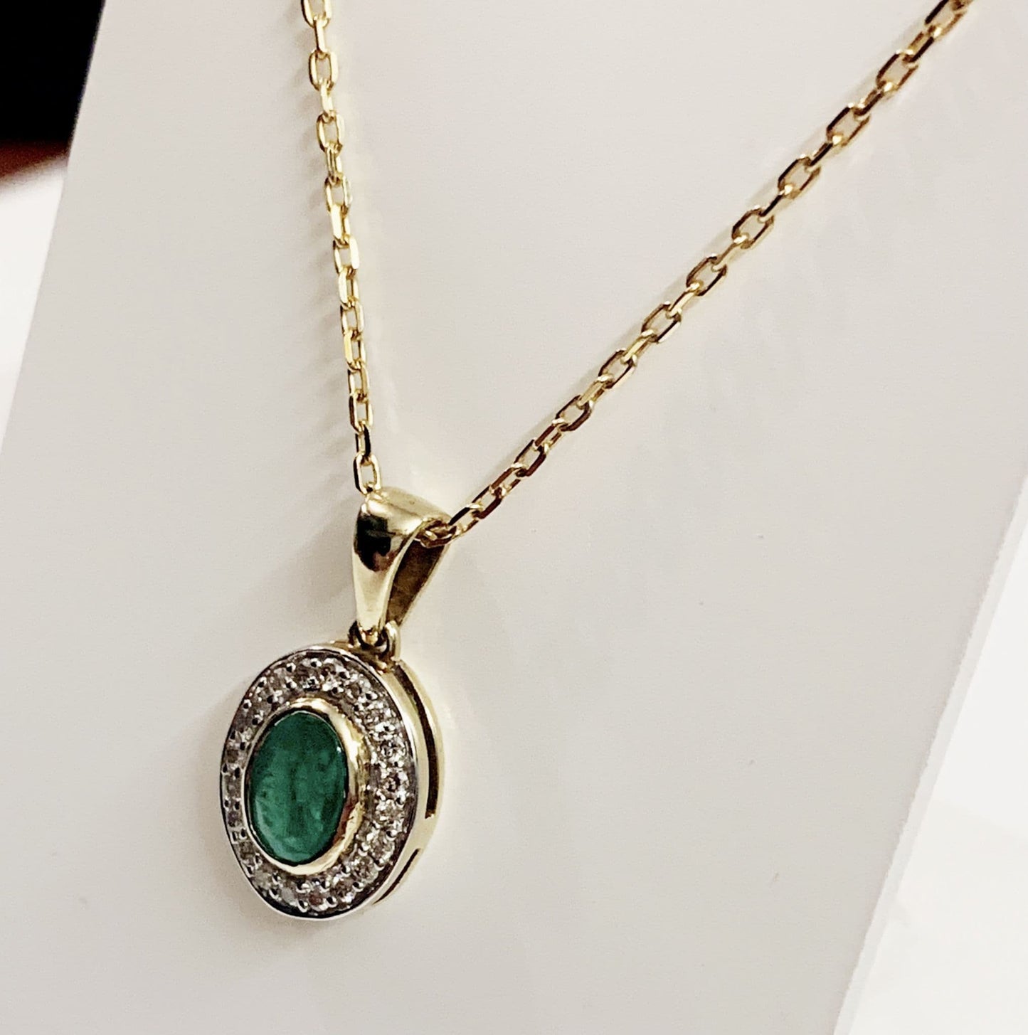 Green emerald and diamond necklace gold oval cluster pendant
