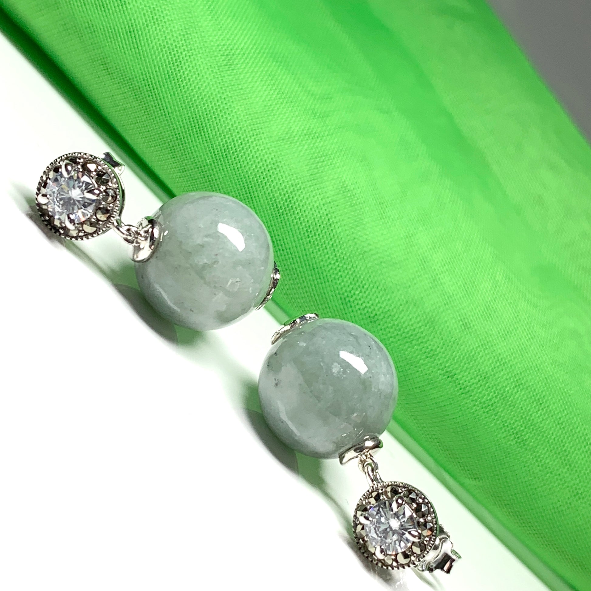 Green jade and cubic zirconia round ball shaped drop earrings