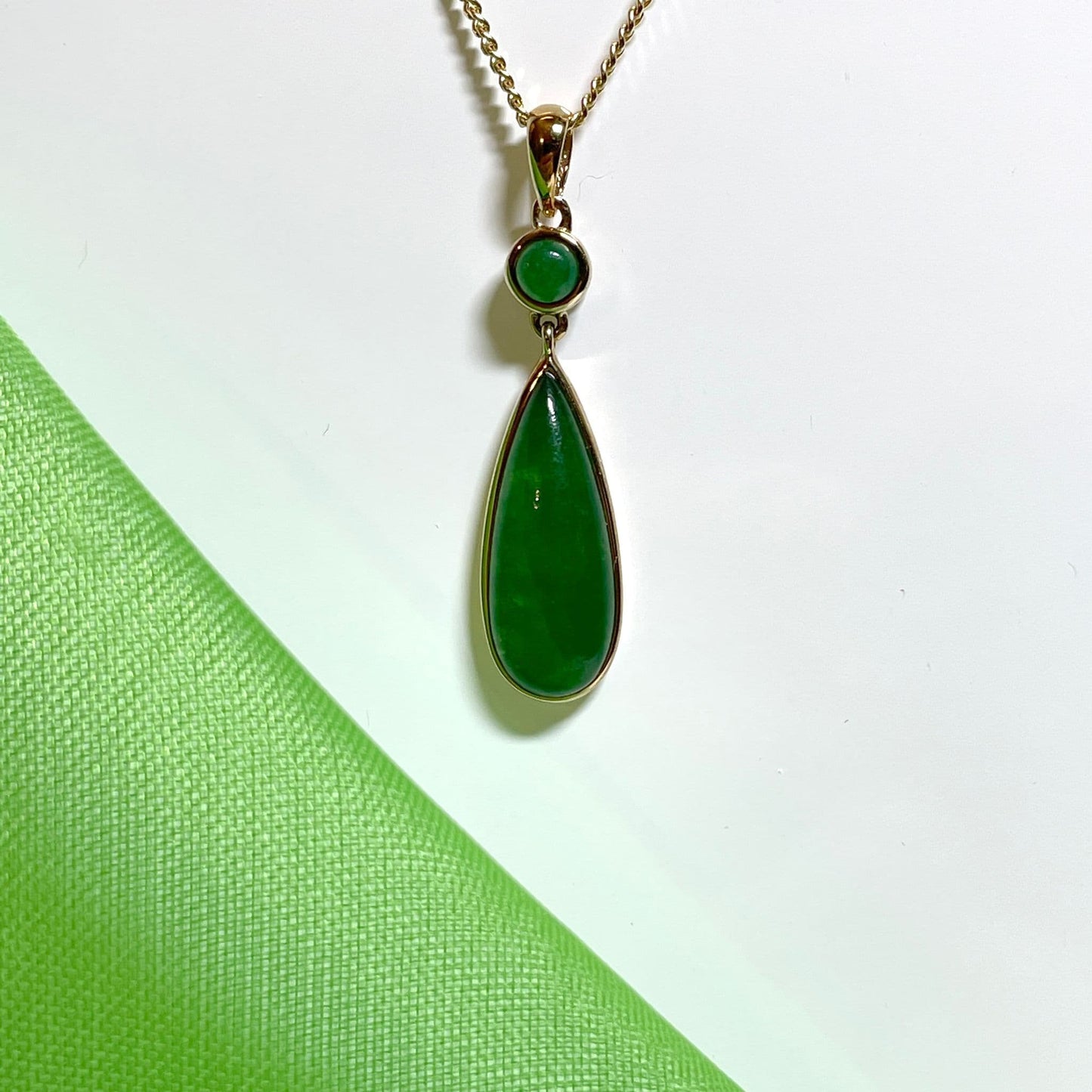 Green jade double yellow gold pear and round shaped necklace