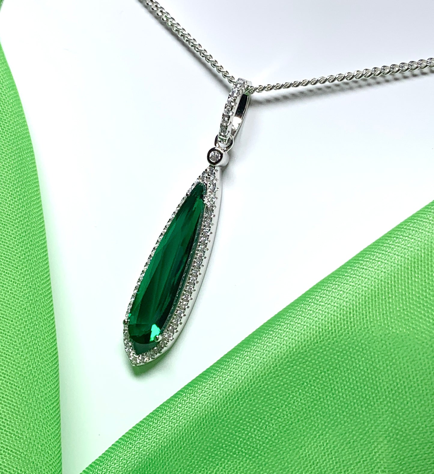 Green pear shaped cubic zirconia silver cluster long drop necklace pendant